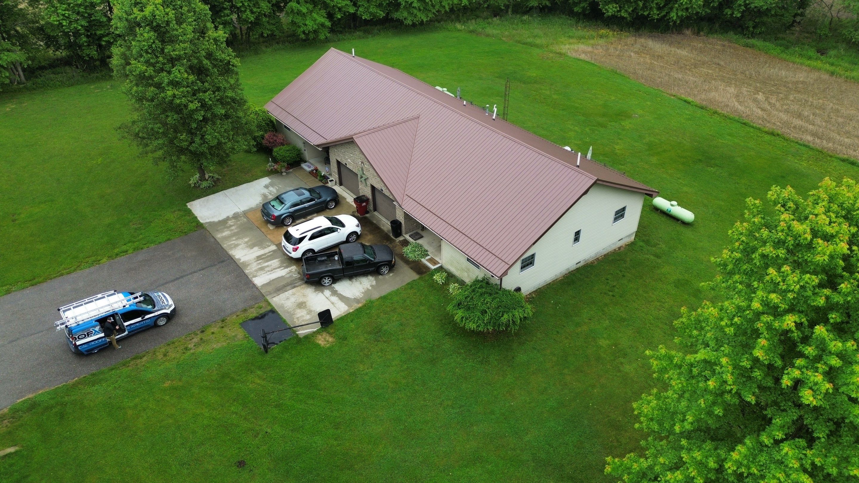 Residential Roofing Installation using Performance Panel Metal - Coca Brown by RoofX 