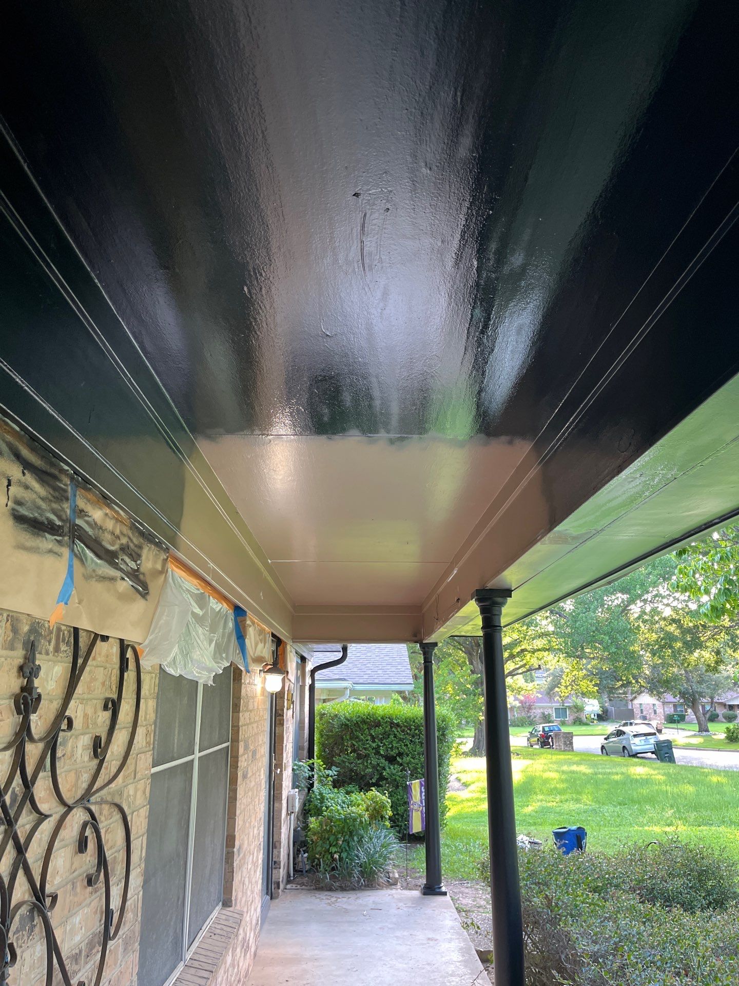 Exterior Painting in Tyler, TX | Eaves, Door & Columns in Elegant Black by Quality Coats Painting