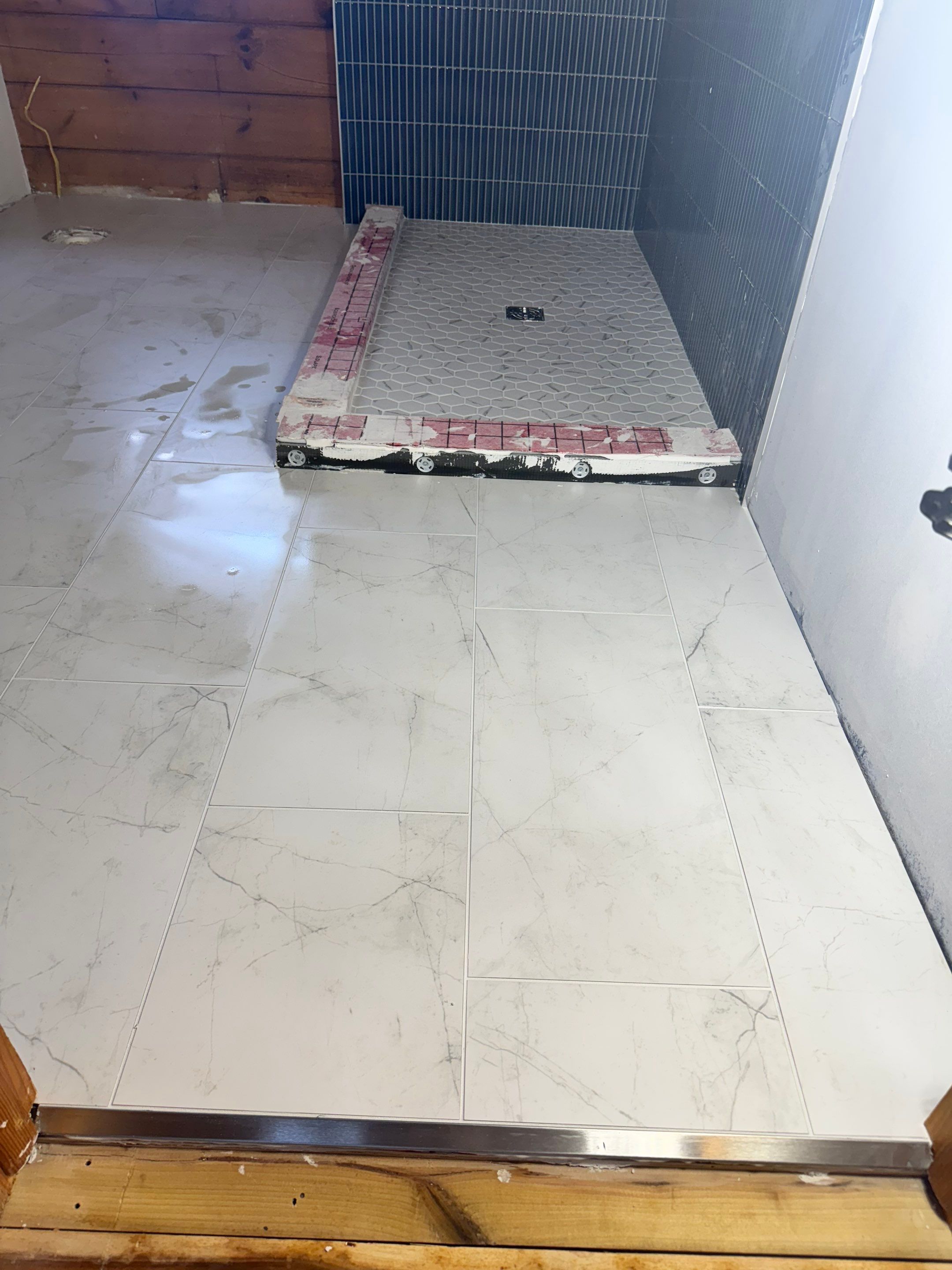 Brandt Double Bathroom Remodel by Integrity Tile and Home LLC