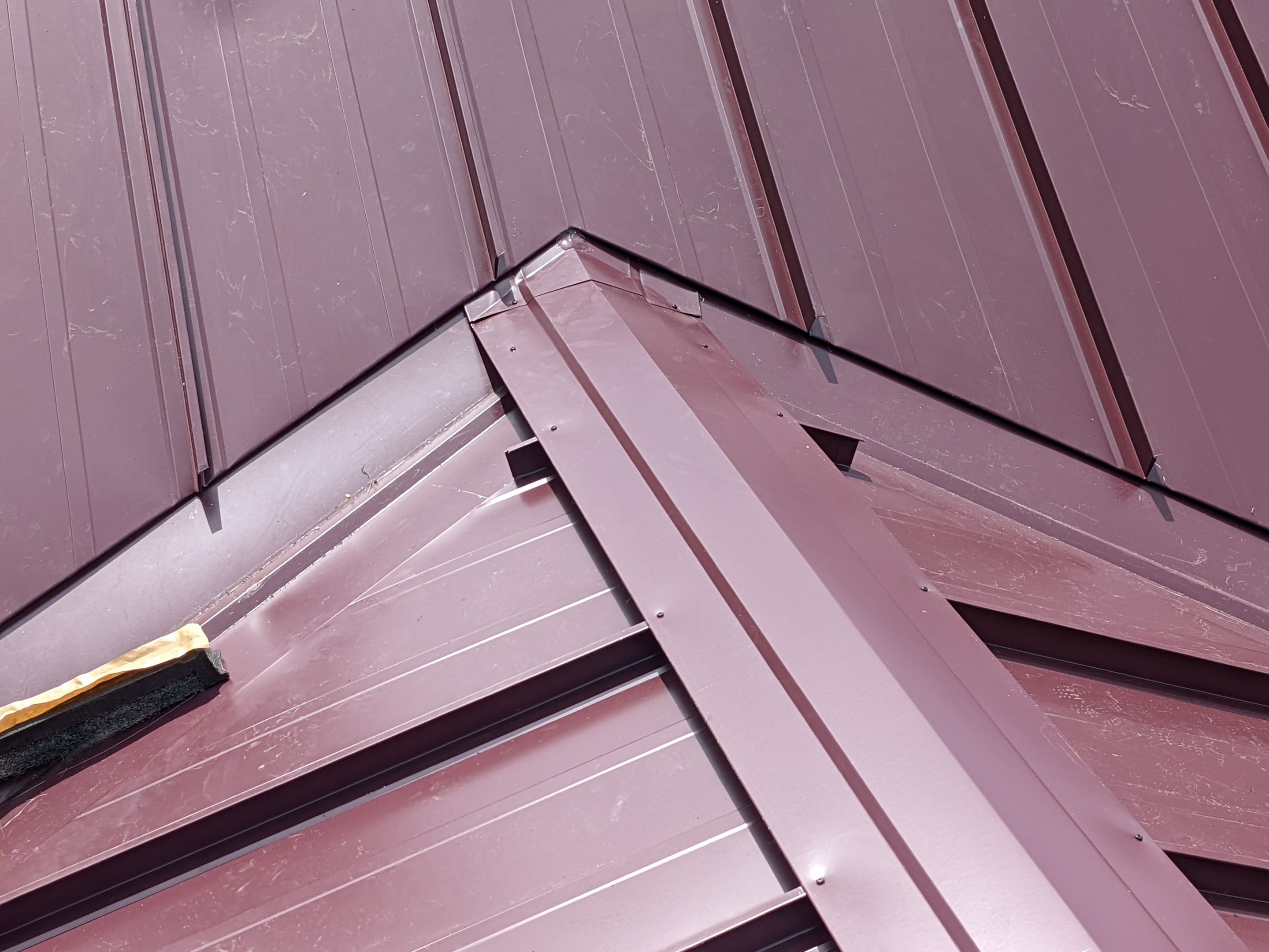 Residential Roofing Installation using 16" Standing Seam Panels by Jay Carter Roofing & Sheet Metal