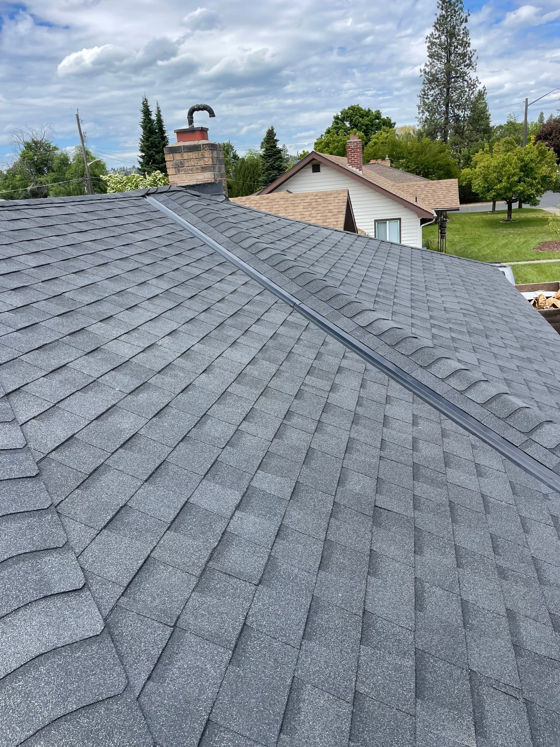 Full Residential Roof Replacement and Sheathing Repair in Spokane N Oak St Spokane, WA 99205 The Denali System - Certainteed Landmark® Shingle - Moiré Black by Alpine Roofing