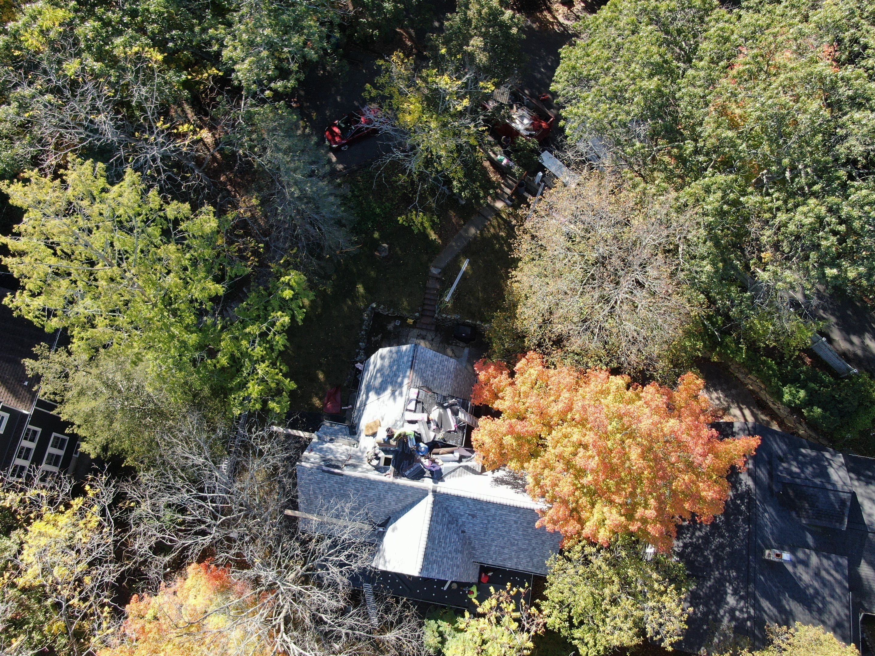 Full Roof & Porch EPDM Replacement with Skylight and Chimney Repairs by Mighty Dog Roofing of Greater Middlesex County