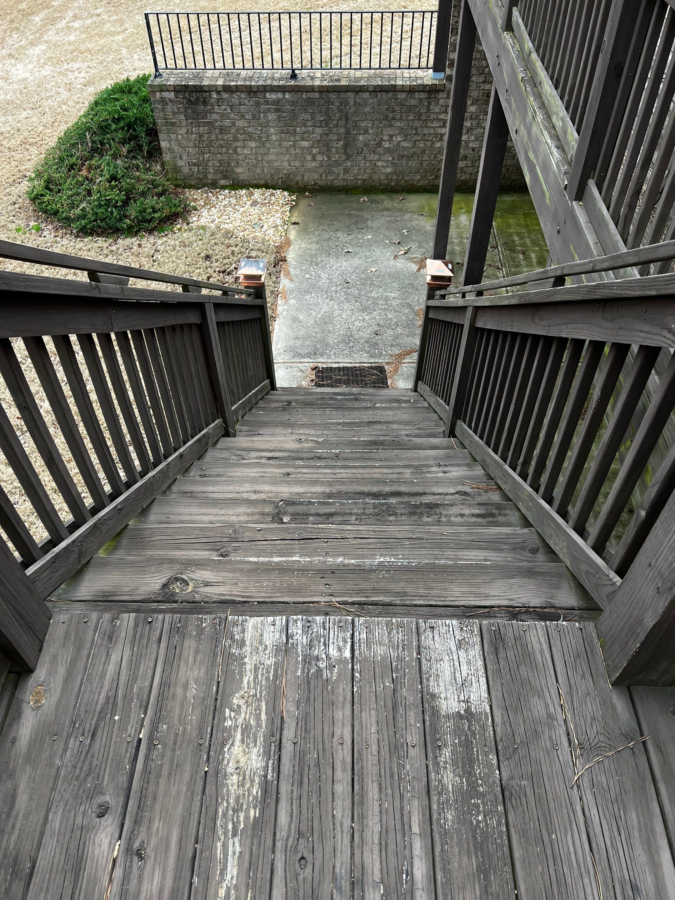 Elevated Pressure-Treated Wood Deck and Staircase in Hampton by Swift Home Renovations