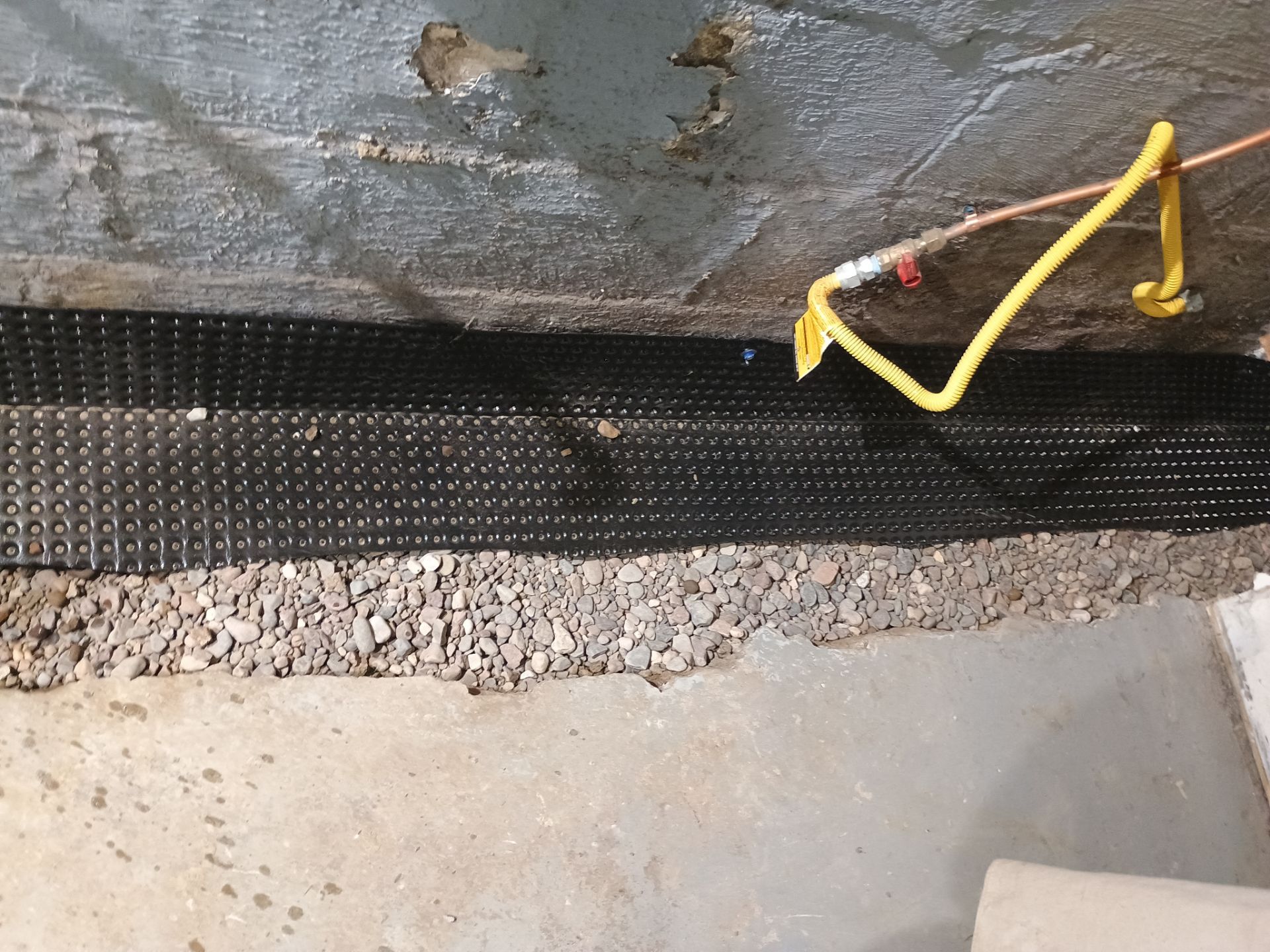 Basement Waterproofing (Drain tile & Sump pump) in North Minneapolis by Waterproofing Northeast