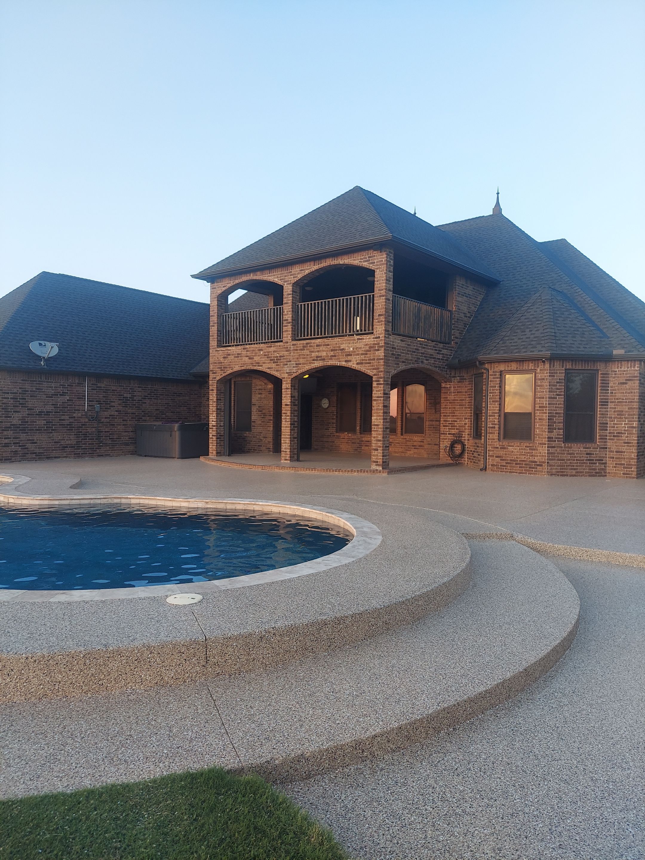 Patio & Pool Deck Coating with Sandstone by Copperhead Coatings
