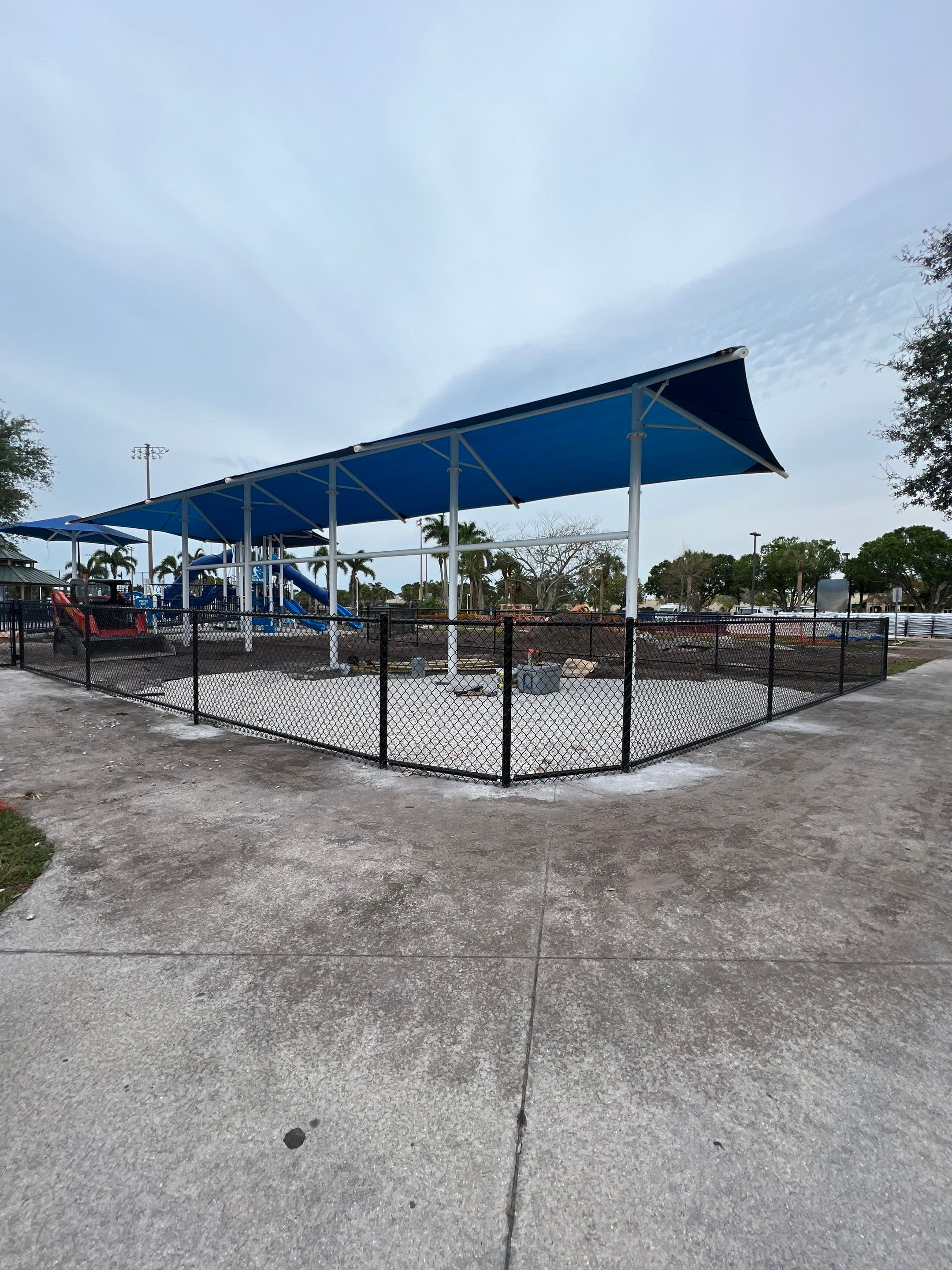 Vinyl Coated Chain-link fence for the City of Naples around Fleischmann Park Playground.  by Asap fence and gates, LLC