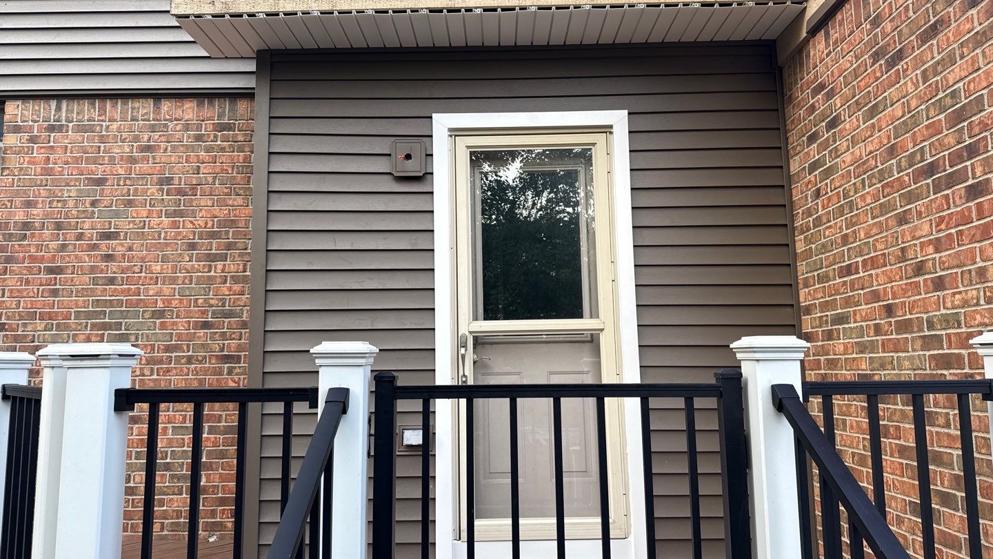 Siding Replacement using Alside Odyssey D4" Flagship Brown by 180 Contractors