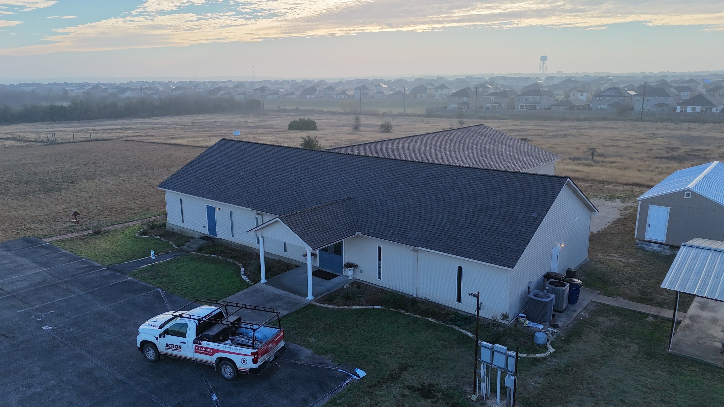 Commercial Roofing Installation using GAF - HDZ - Weathered Wood by Action Exteriors Austin