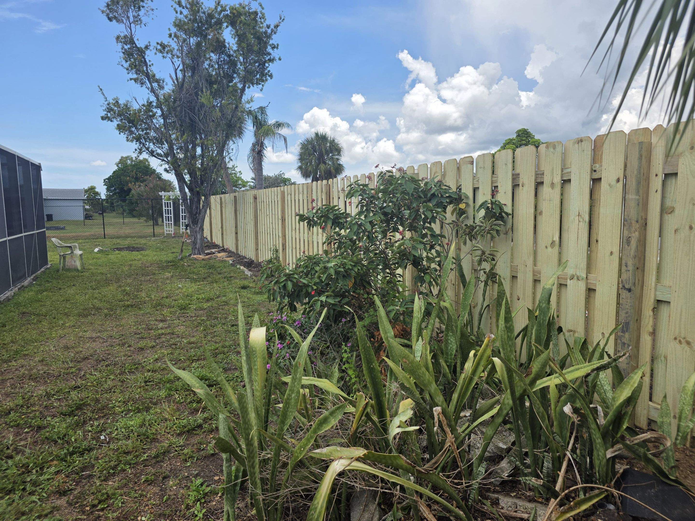 Pressure-Treated Wood Privacy Fence and Chain Link Installation in Port Charlotte by True Fence LLC