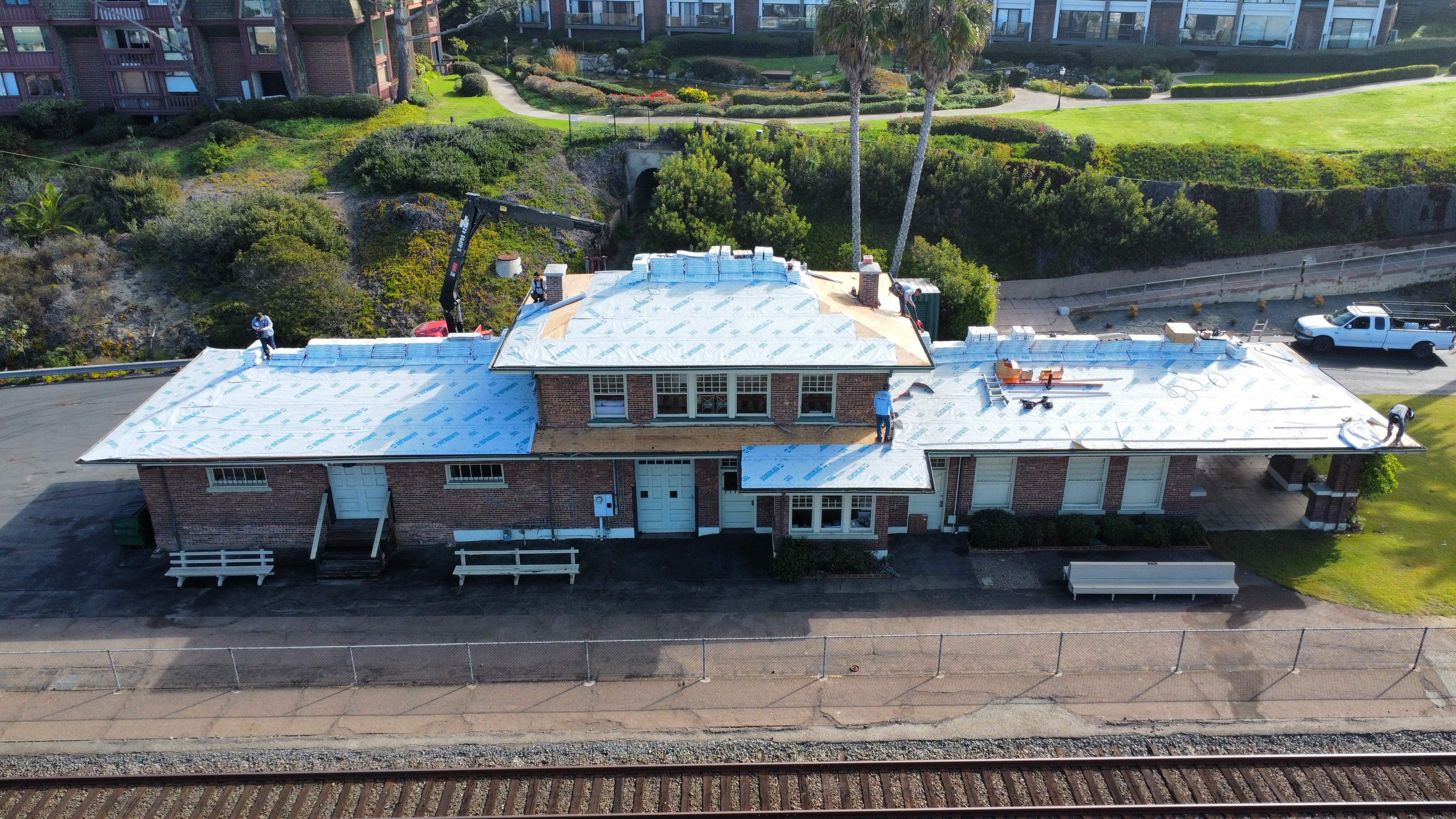 Commercial Roofing Installation using Asphalt Shingle by Dana Logsdon Roofing and Solar Inc.