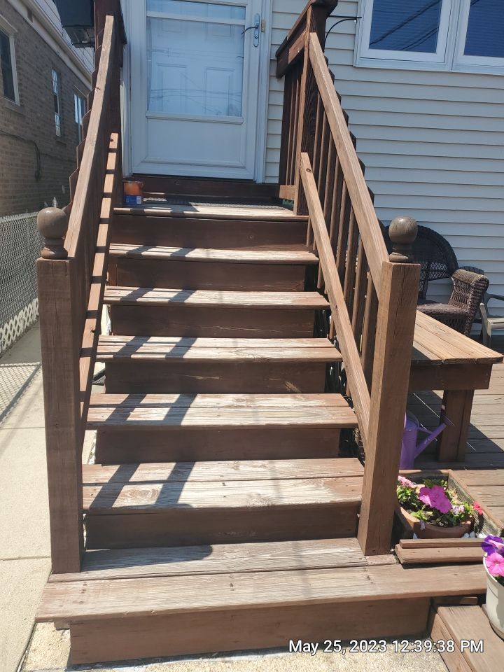 Wood cleaning and staining using Armstrong cloark oil stain by Northern Power Washing LLC.