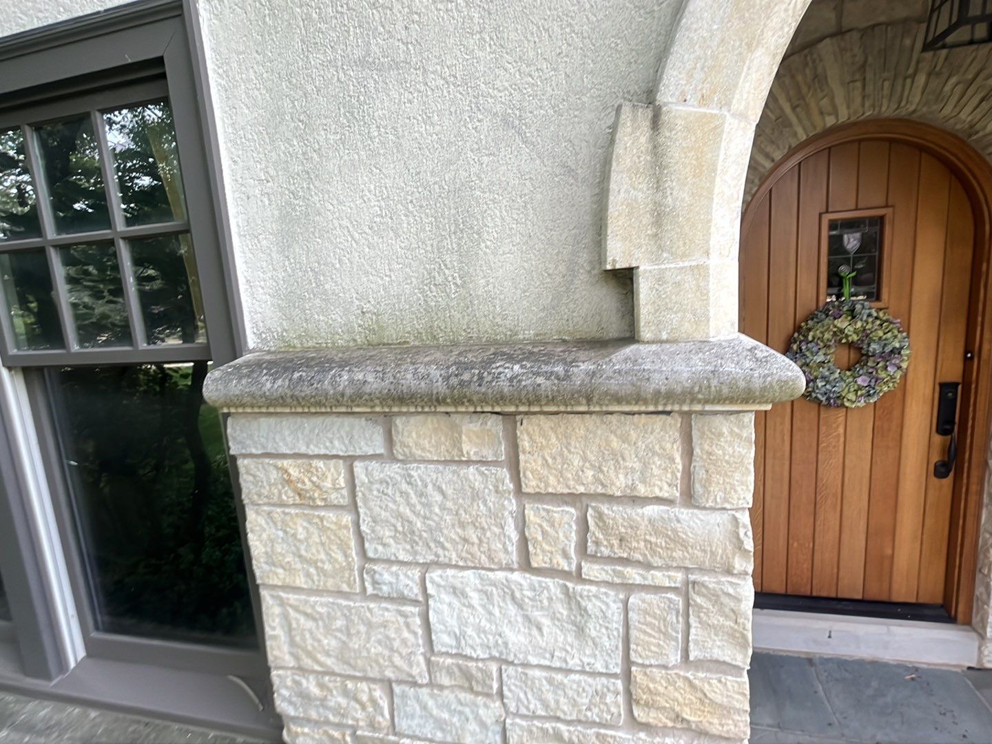 Northbrook, IL stucco home soft wash and stone cleaning by Northern Power Washing LLC.