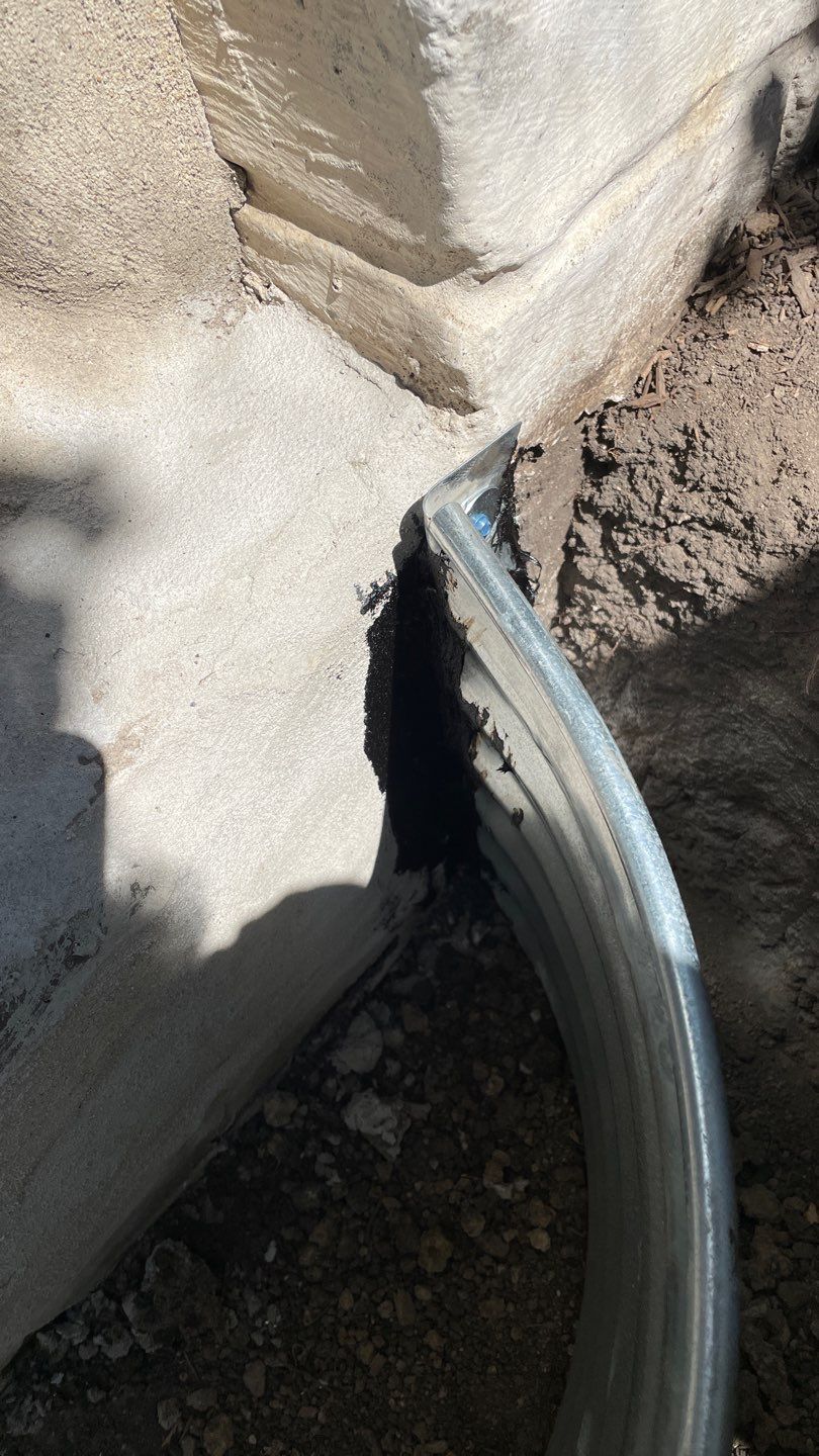 Drain Tile, Window Wells & Buried Discharge in Minneapolis by Waterproofing Northeast