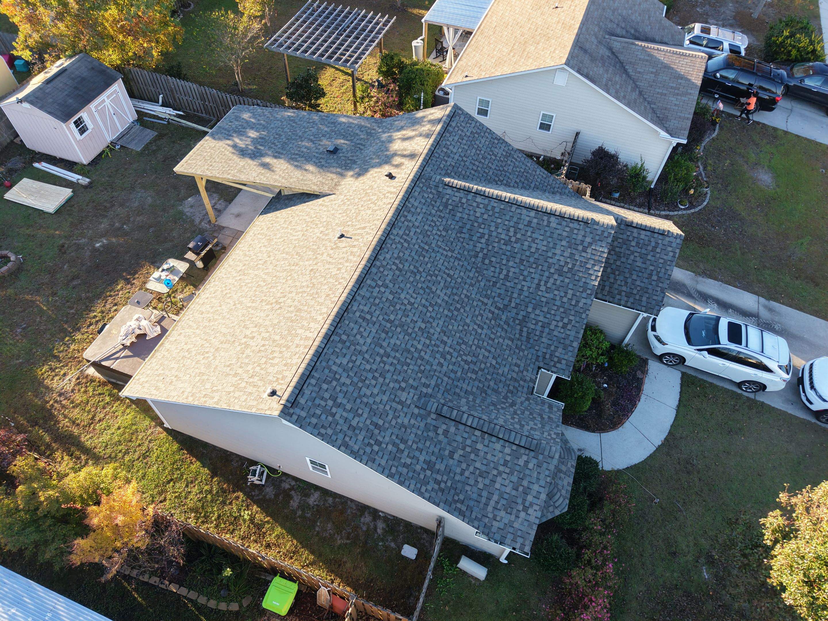 Covered Porch Build and Fortified Roof Replacement with Solar Panels by RGR Construction and Roofing, LLC