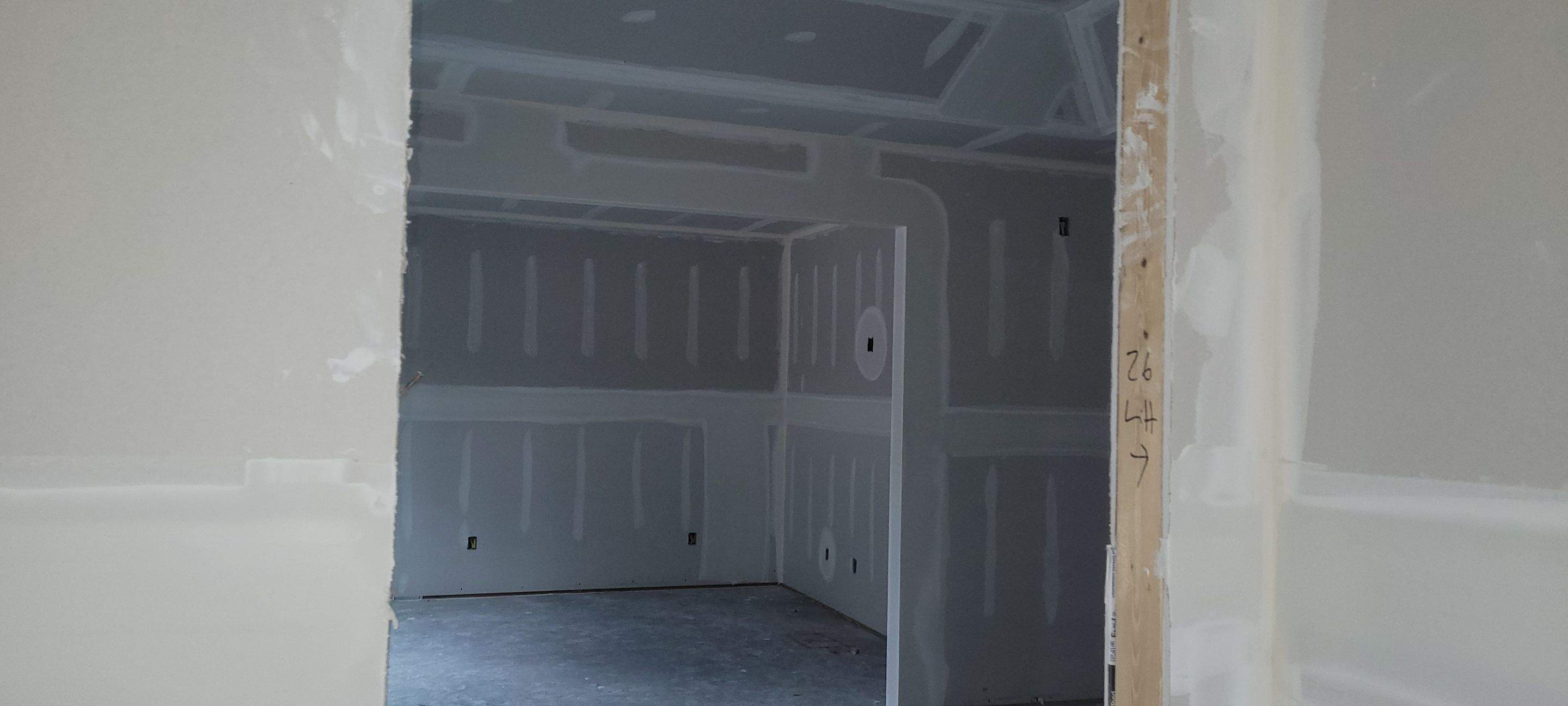 New Home Construction using brick and vertical vinyl by Cornerstone Home Builders, LLC
