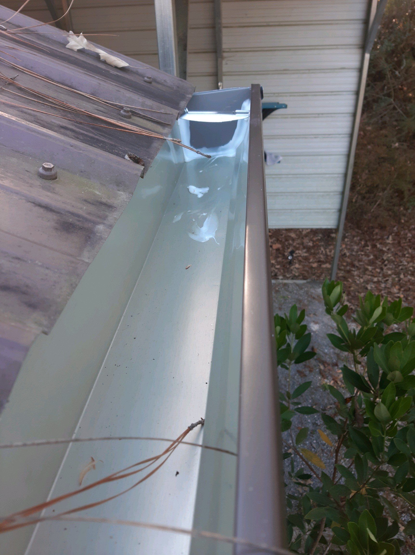Gutter Installation using Royal Brown K-Style Seamless Gutters and LeafBlaster Pro Gutter Guards by Gutter Professors