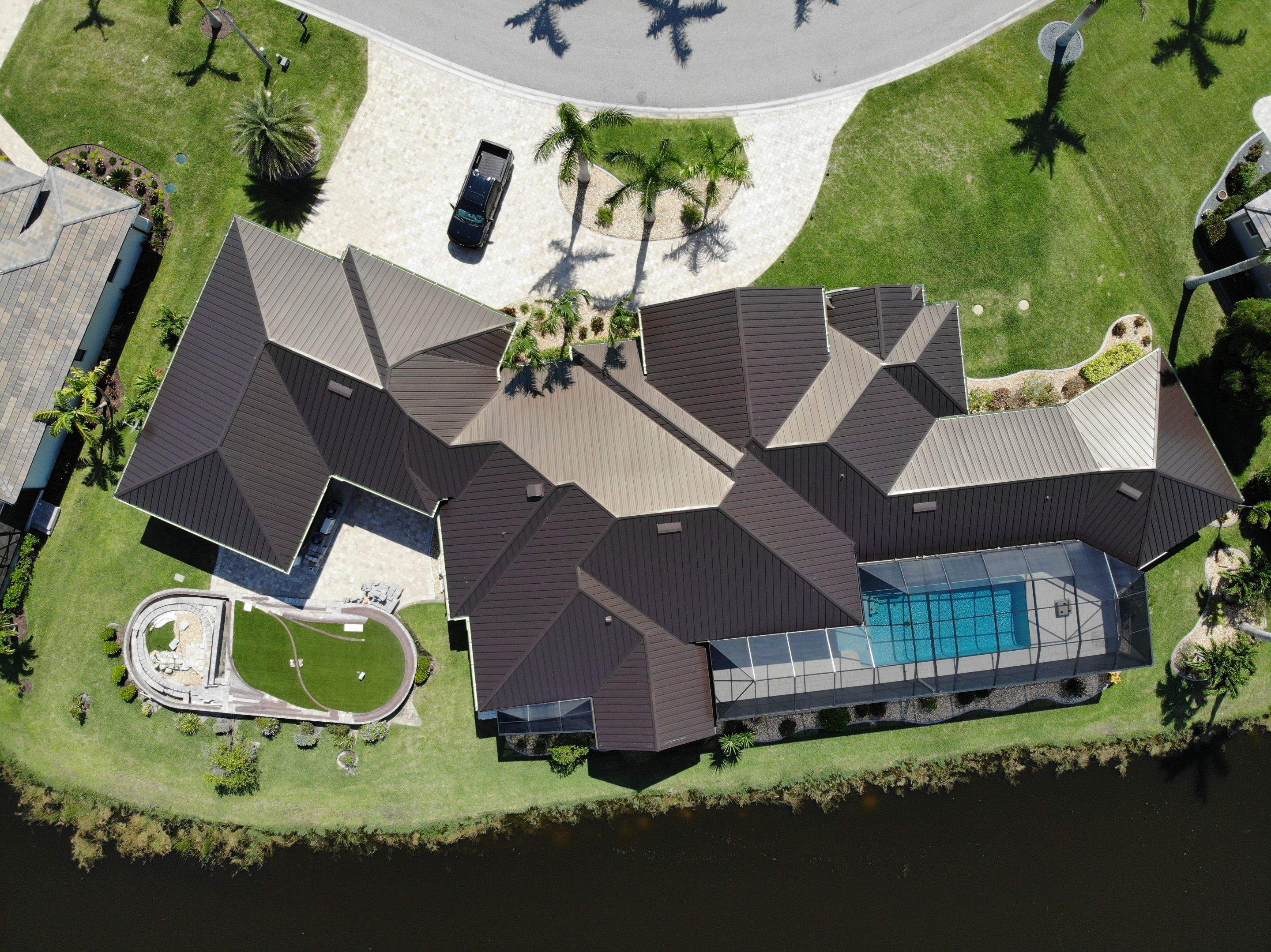 Residential Roofing Installation using Standing Seam Metal Roof in Cape Coral, FL by International Roofing