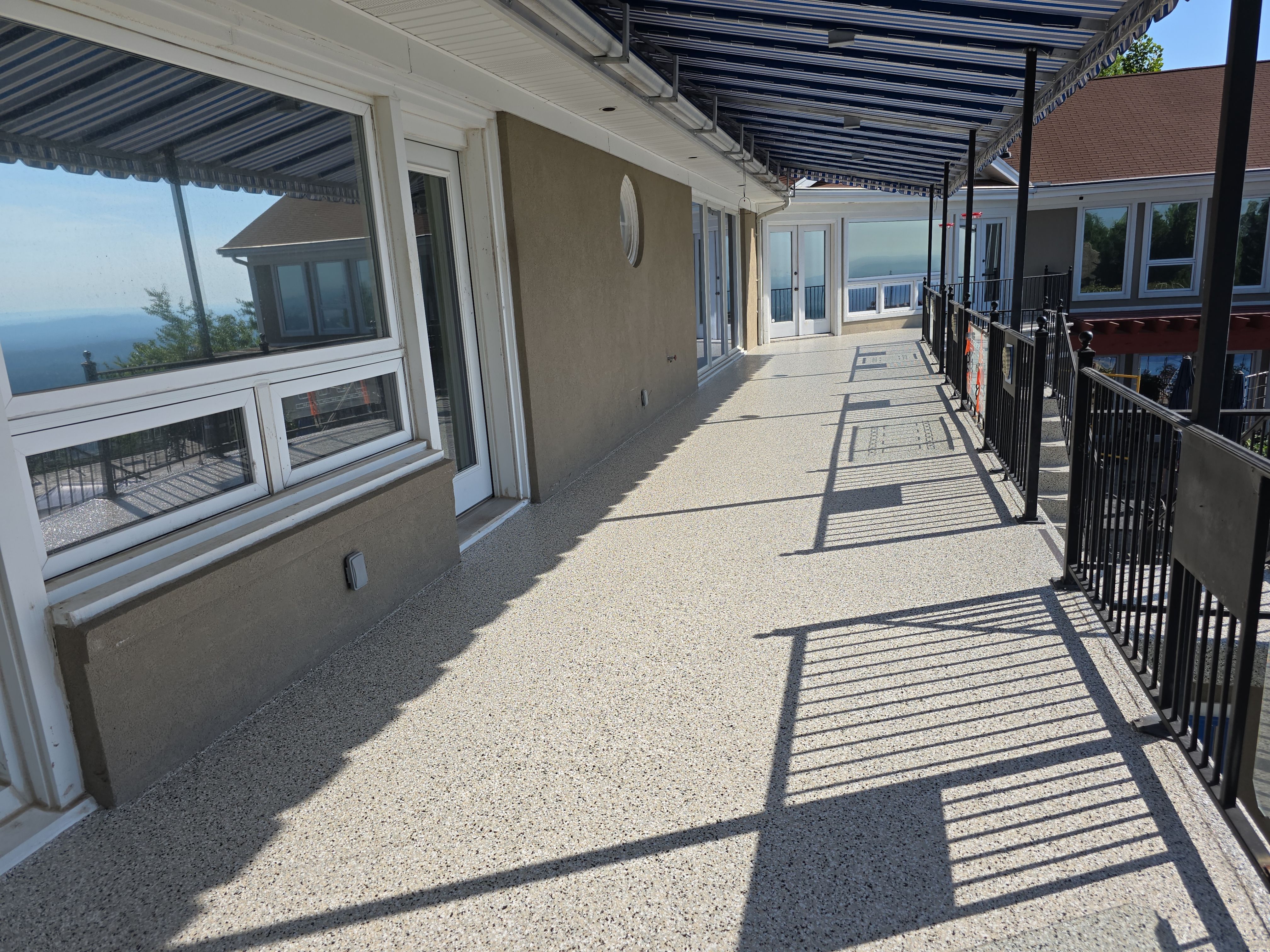 Epic Patio Remodel with a stunning view! by Elite Floor Solutions