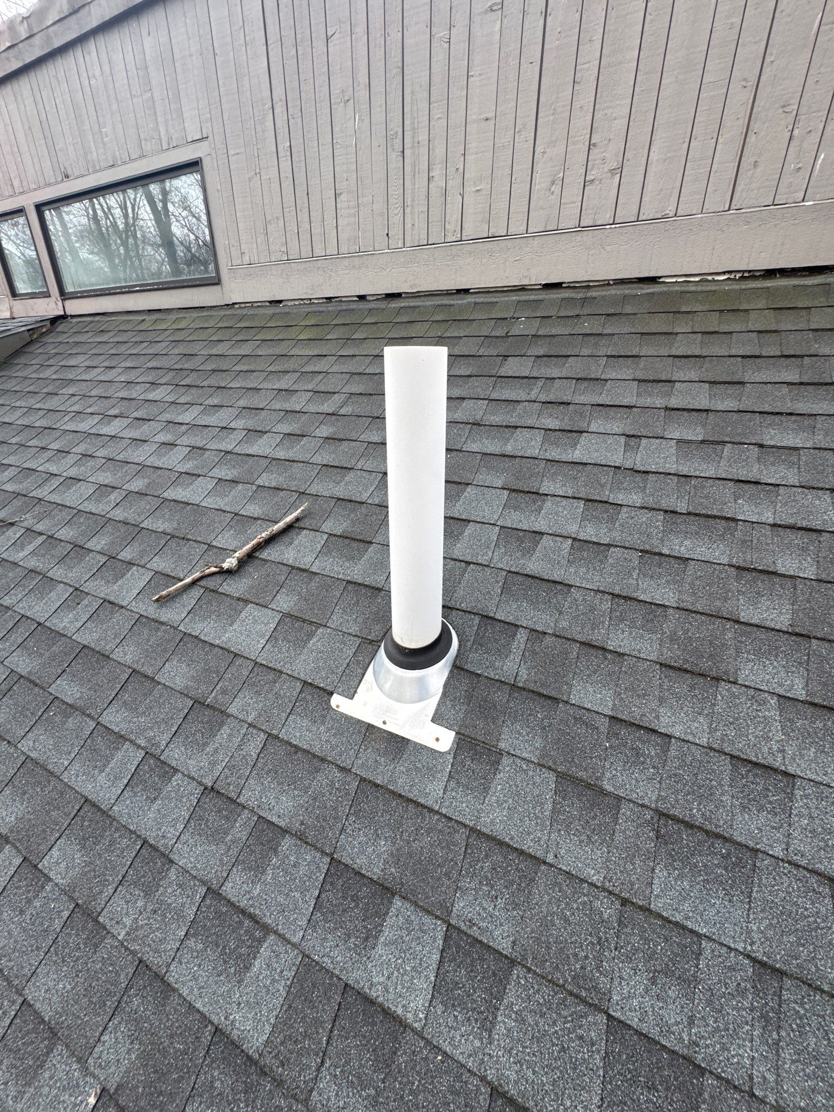 Nashua NH Roof Replacement with Owens Corning Slatestone Gray Shingles, Black Drip Edge, and White AZEK Trim by Compass exteriors