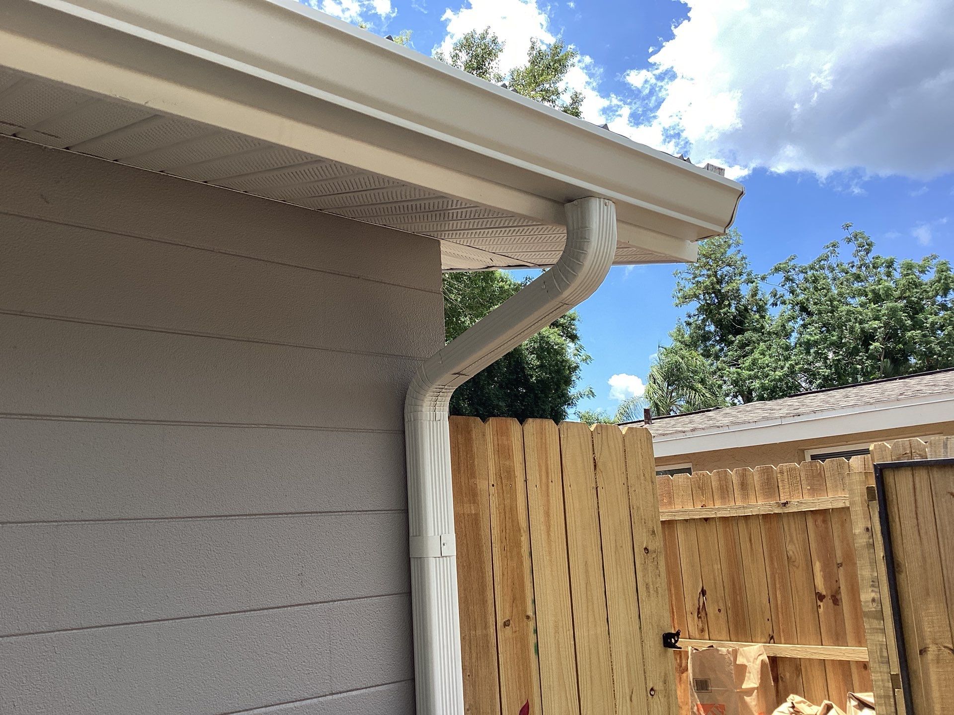 White K Style Seamless Gutters using 3X4 Elbow Downspout in Sarasota FL by Gutter Professors