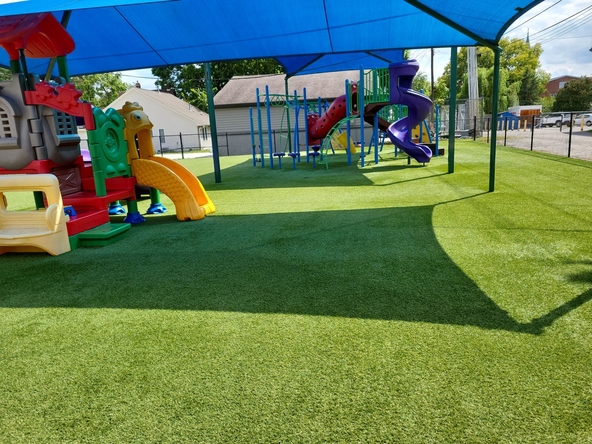Indianapolis Child Care Center Playground Synthetic Turf Installation by Southwest Greens Midwest
