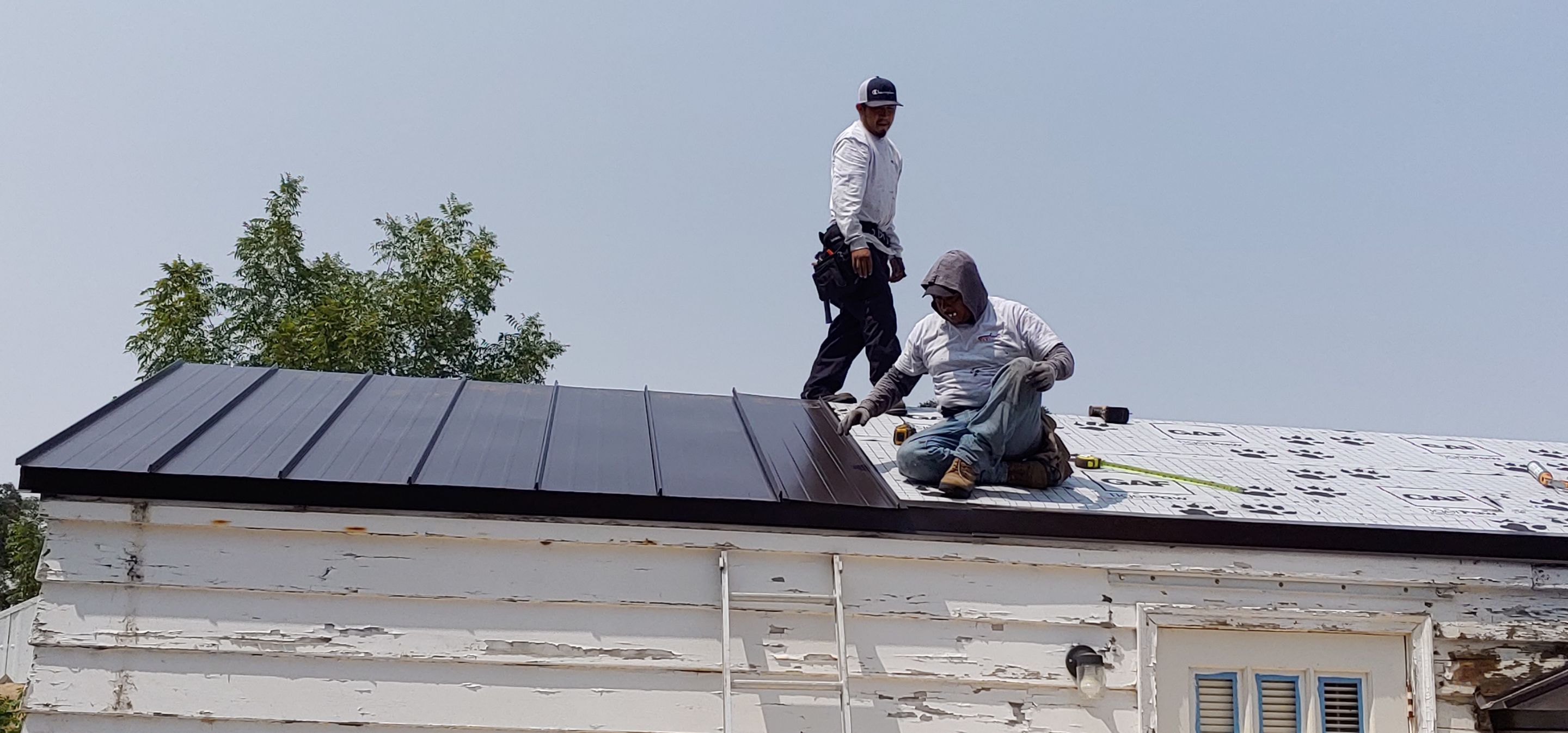 Residential Roofing Installation using Standing seam metal roofing system by Straight Edge Roofing Inc