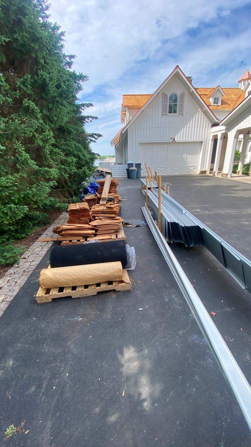 Cedar Shake Roof Replacement with Half Round Gutter Installation by Custom Installations