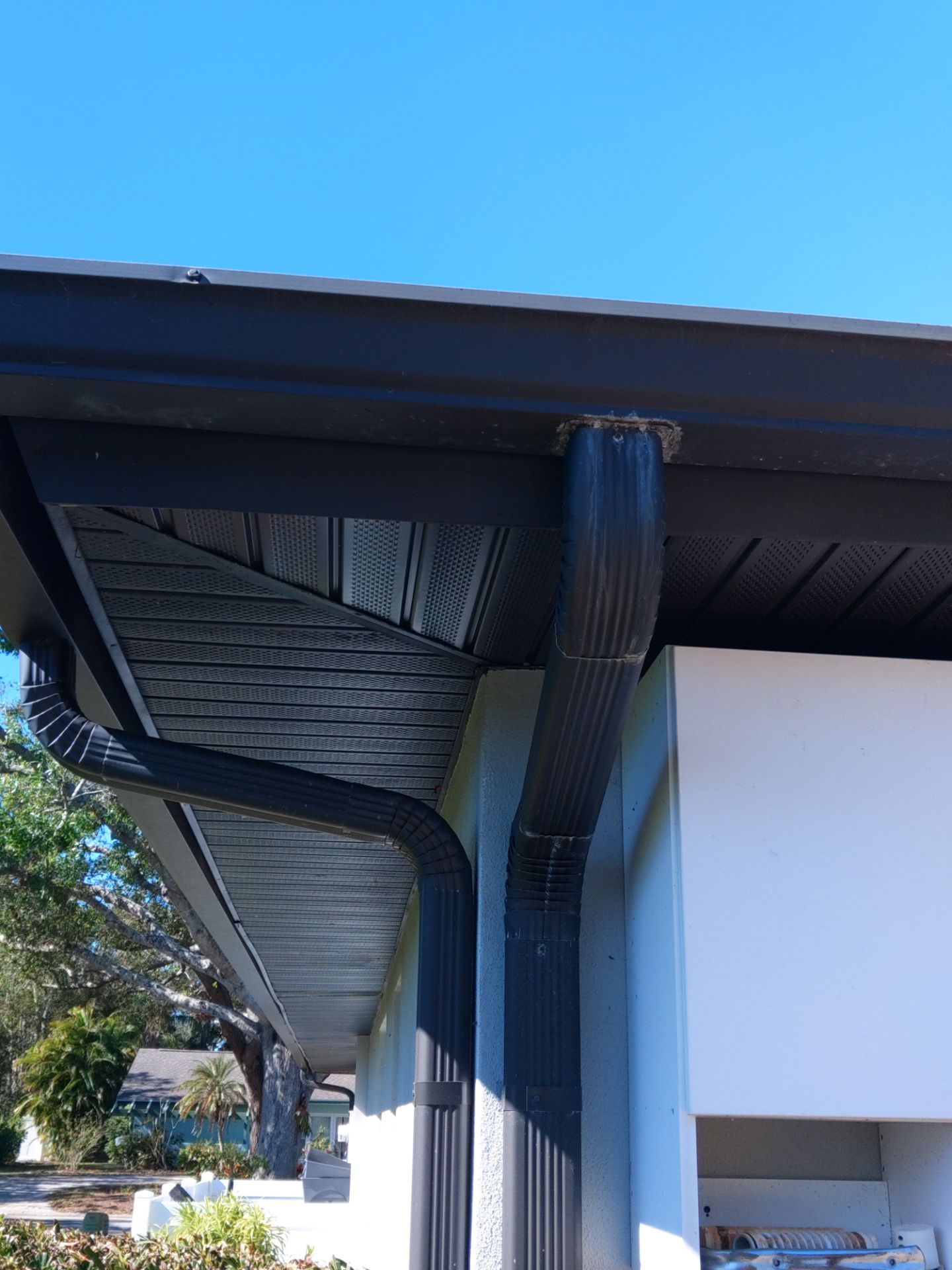 Dark Bronze Soffit Installation in Sarasota FL by Gutter Professors