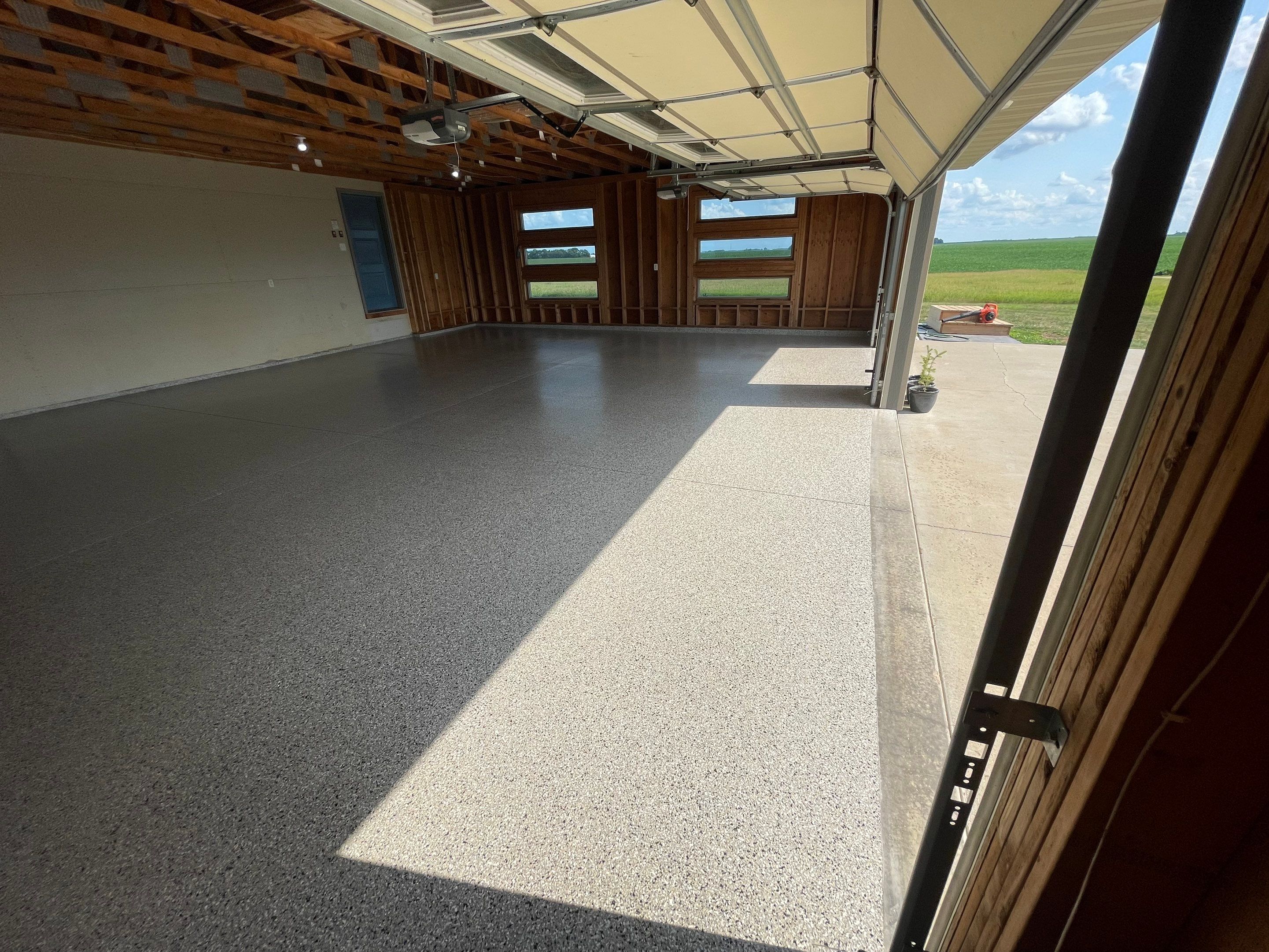 Cabin Fever Coating for Detached Garage in Dell Rapids by Select Painting, Coatings & Garage Cabinets