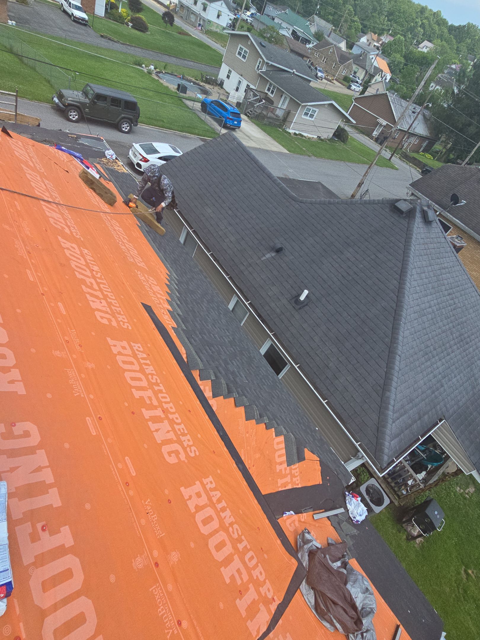 Residential Roofing Installation using GAF Timberline HDZ Charcoal by Rainstoppers Roofing