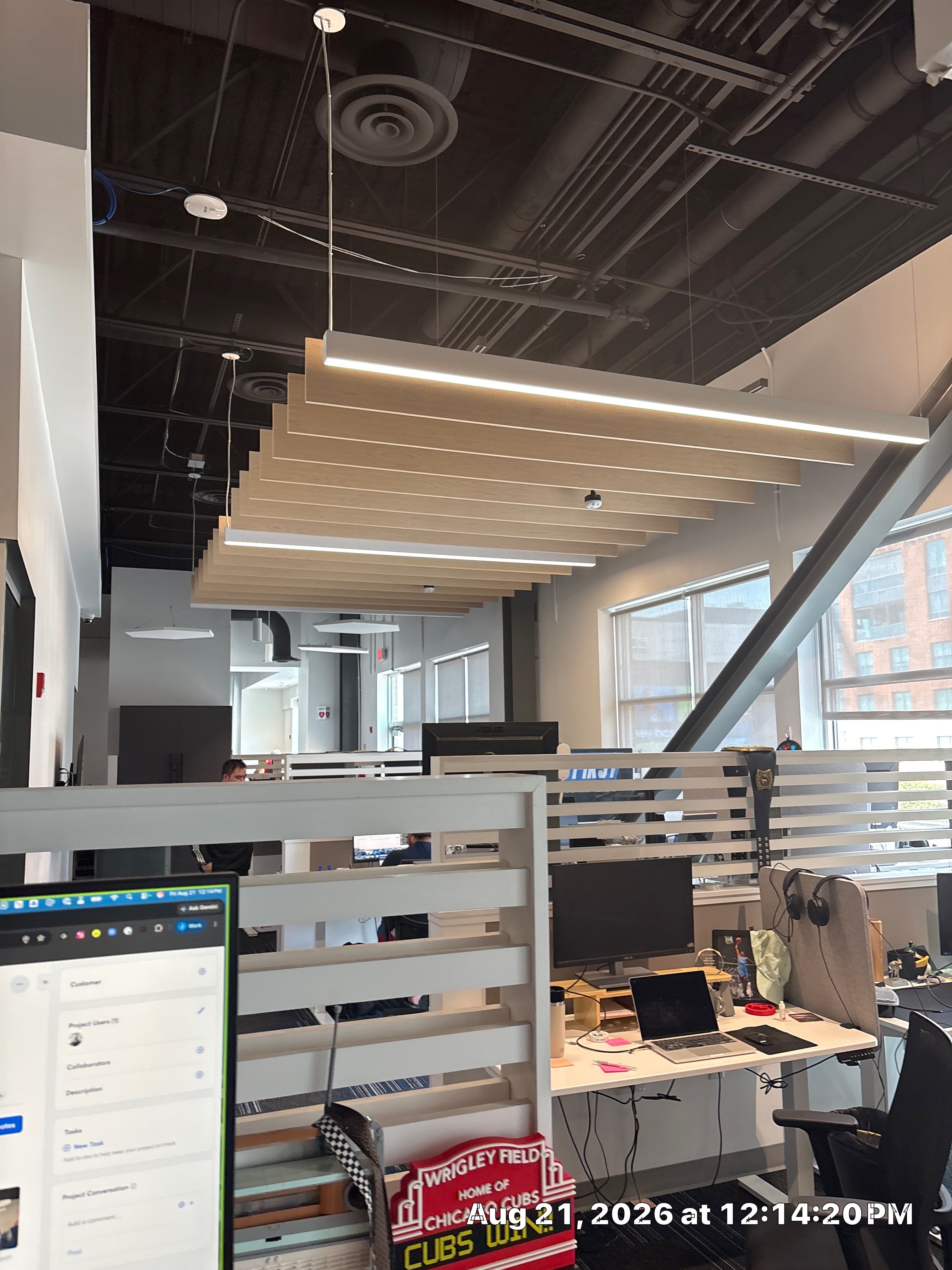 Lincoln Corporate Office Build-Out with Slatted Partitions and Acoustic Baffles by CompanyCam Sales Demo