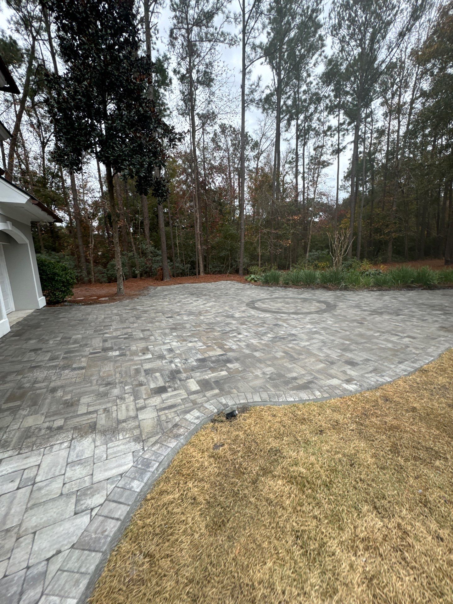 Custom Paver Driveway and Textured Pool Deck Installation in Hilton Head Island by Lowcountry Scapes, LLC