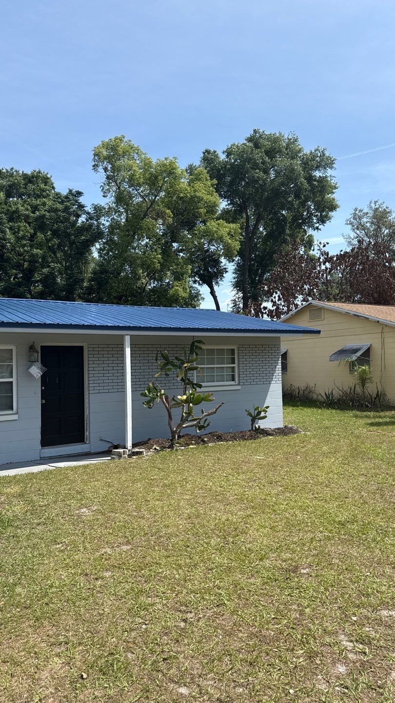 Blue Metal ReRoof and Decking Replacement in Casselberry by Tip Top Roofing Co., Inc.