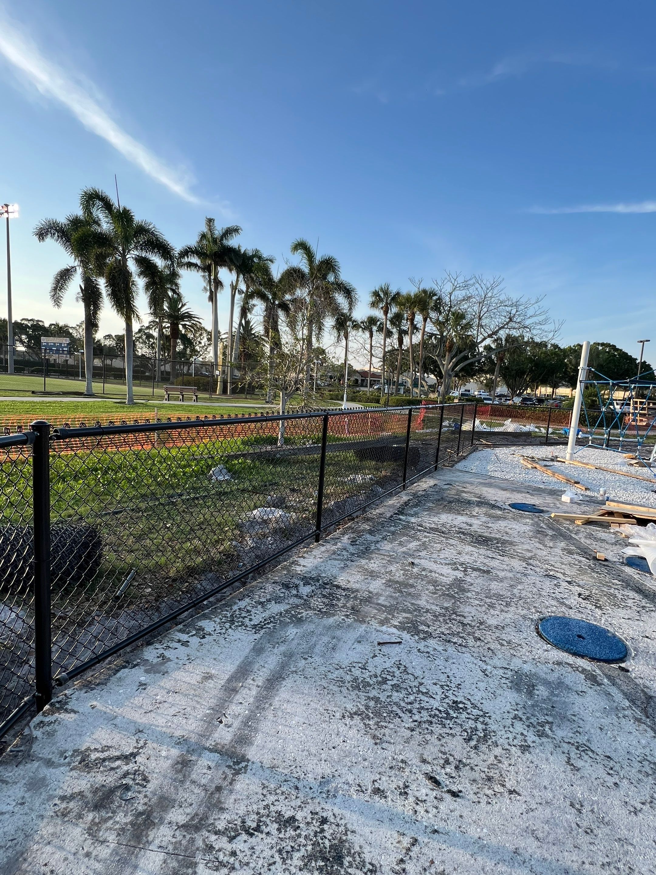 Vinyl Coated Chain-link fence for the City of Naples around Fleischmann Park Playground.  by Asap fence and gates, LLC