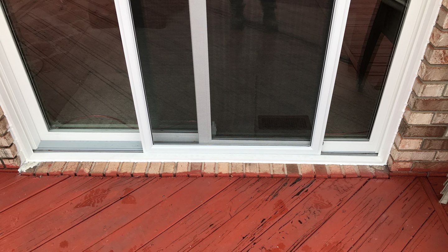 Deck Refurbush and Door Replacement using Trex Decking and Railing.  Polaris Patio Doors by Secure Construction Company Inc