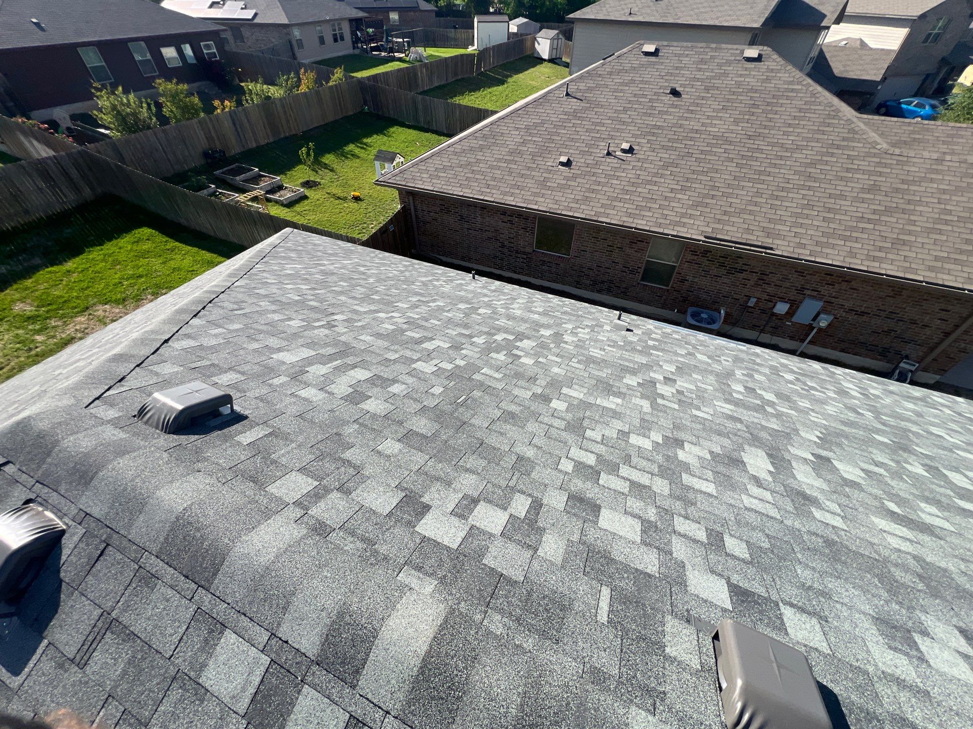 Residential Roofing Installation using IKO Nordic Class 4 Impact Resistant 30yr Architectural Shingles. Color: Castle Grey by WR Roofing Solutions