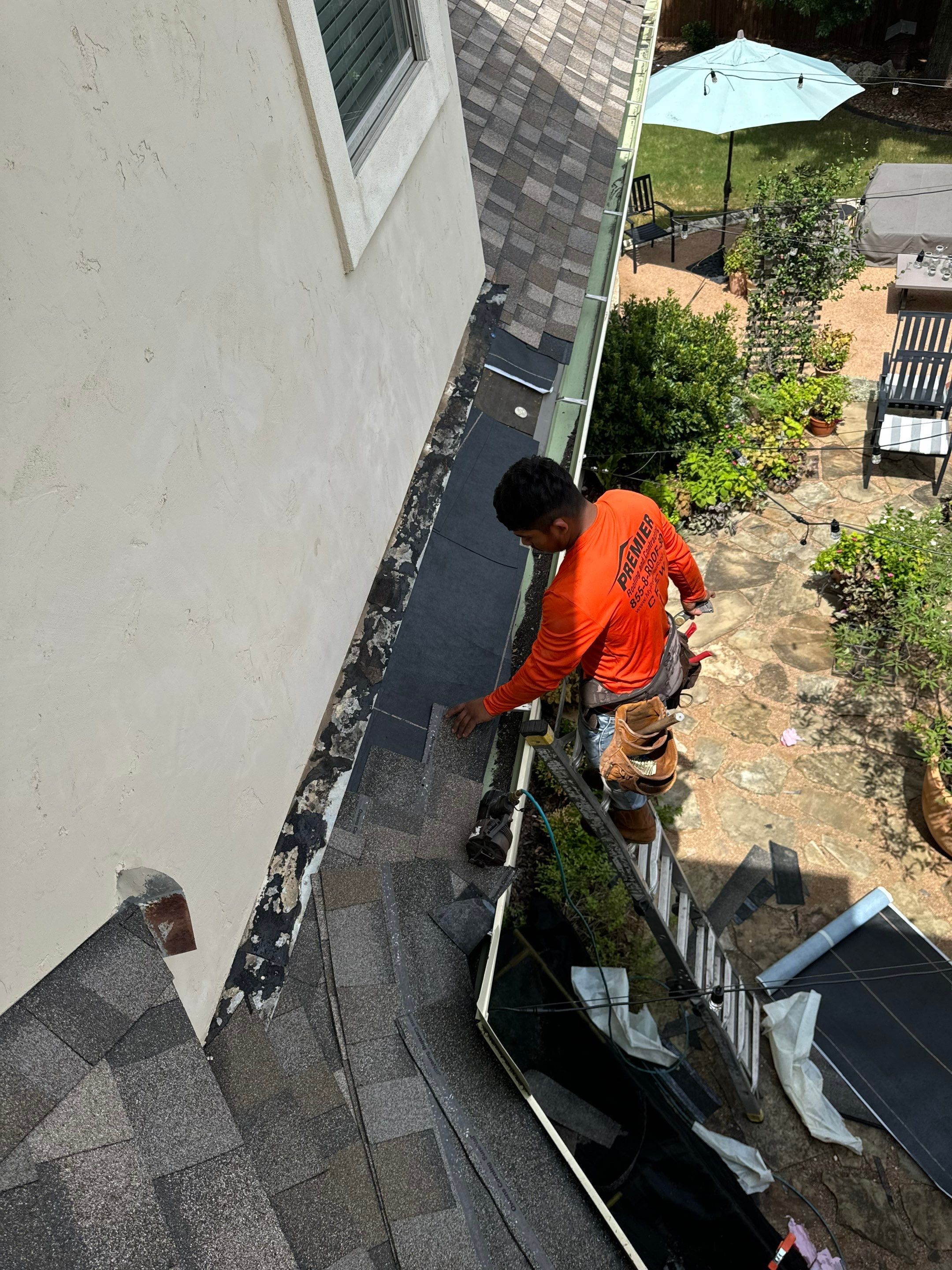 Residential Roof Replacement using 30 Year Laminate Shingles with High Profile Ridge by Premier Roofing and Contracting
