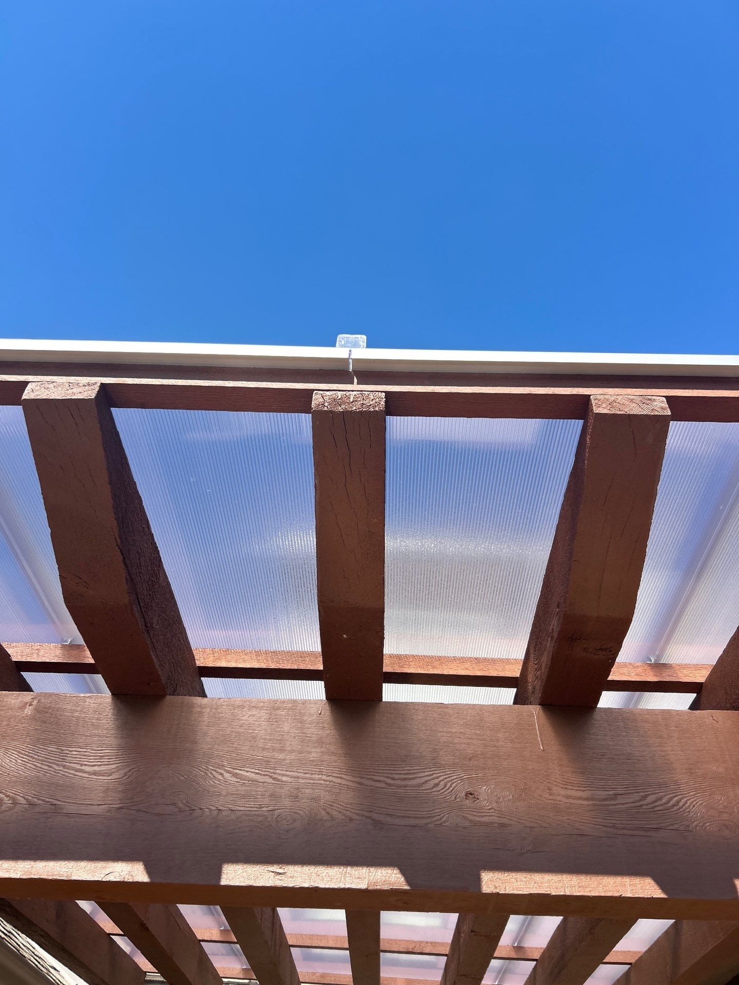 Siding Replacement and Exterior Painting and Pergola Cover Install in Edmond, OK by McCann's Roofing and Construction