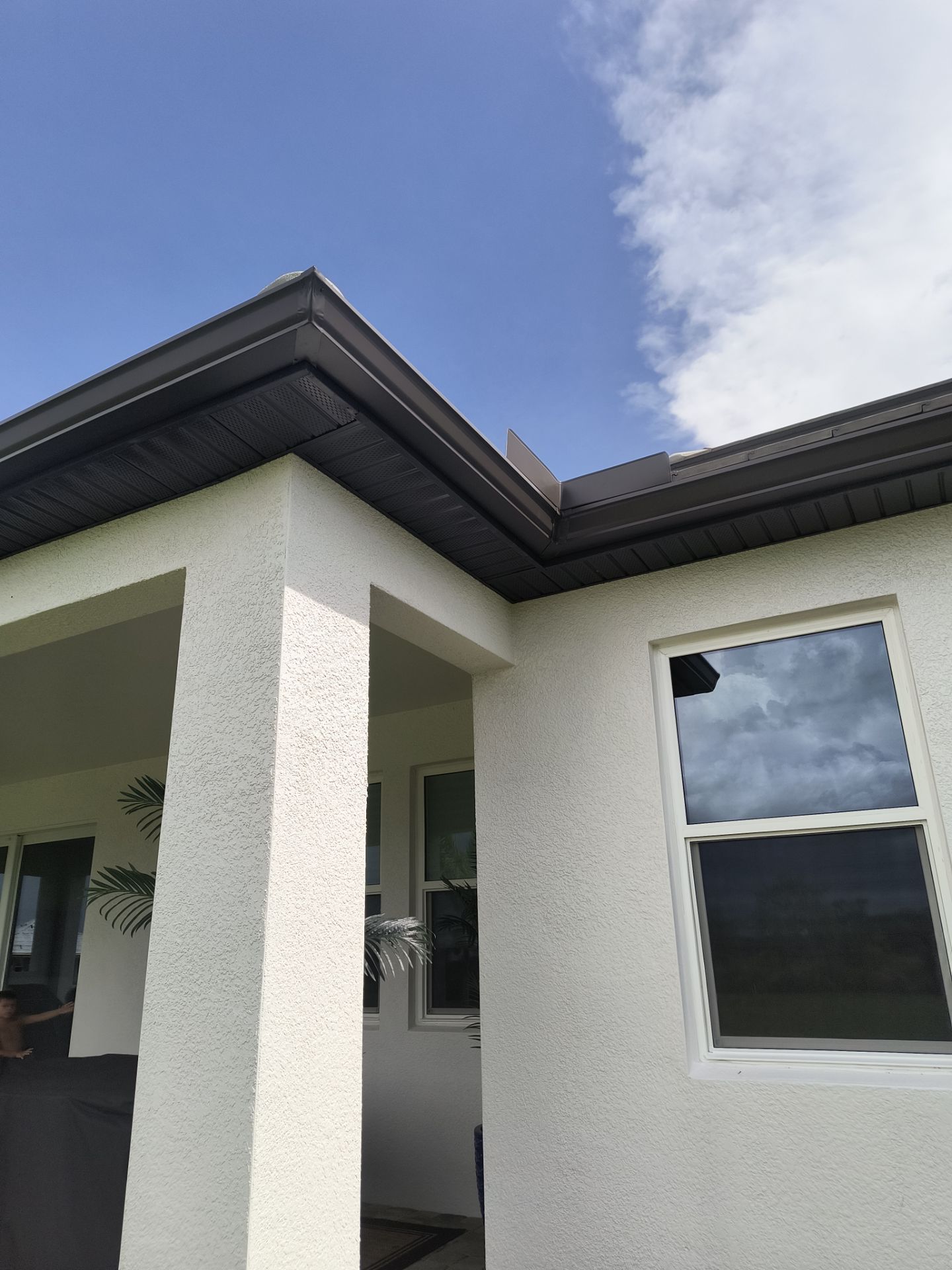 Dark Bronze Gutter Installation in Bradenton FL by Gutter Professors