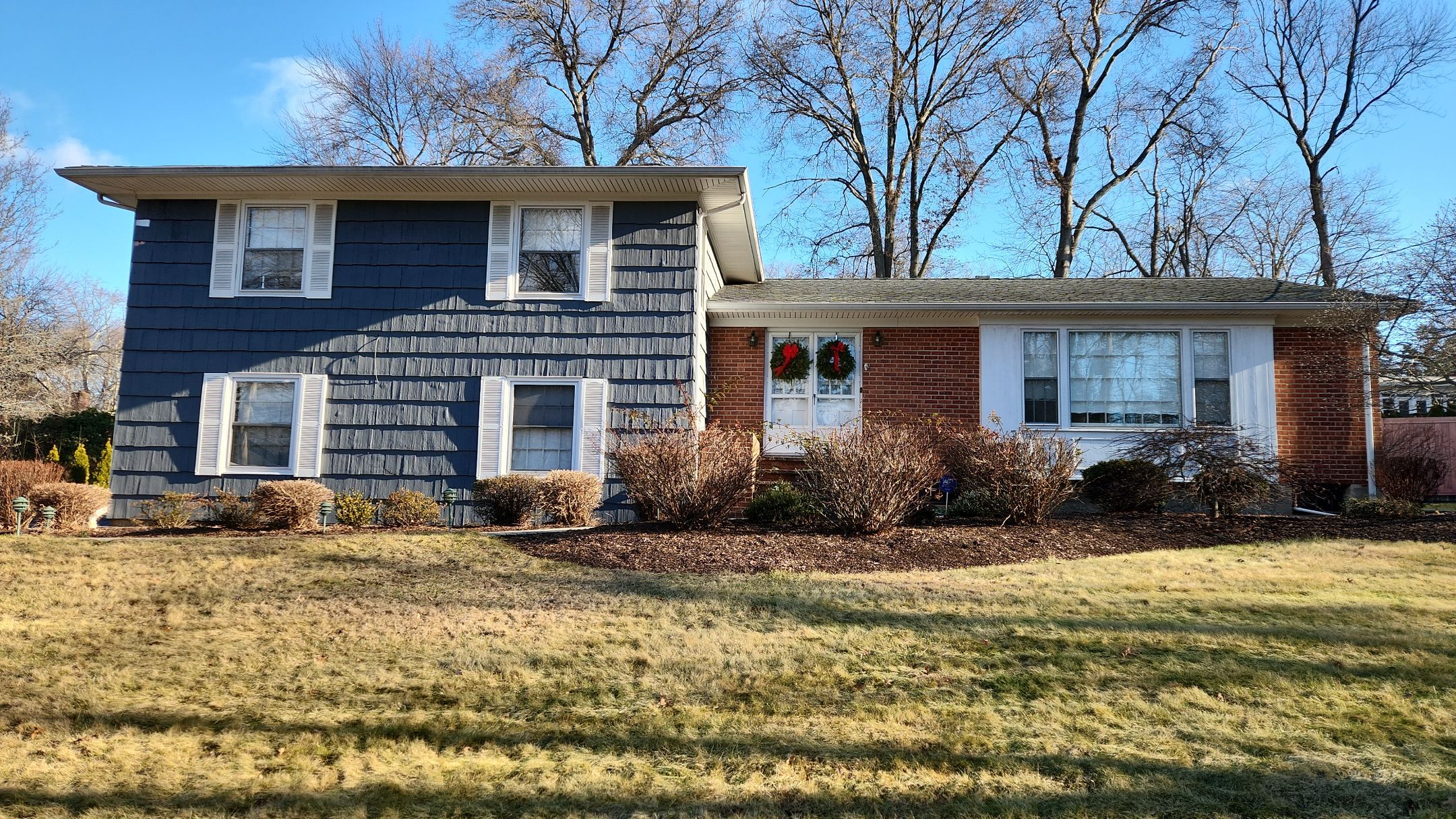 Elevated Siding with Cert Cedar Impressions D/7 Perfection straight bottom, Midnight Blue and Cert Monogram D/4 x 25' clapboard, Midnight Blue by DiGiorgi Roofing and Siding Inc