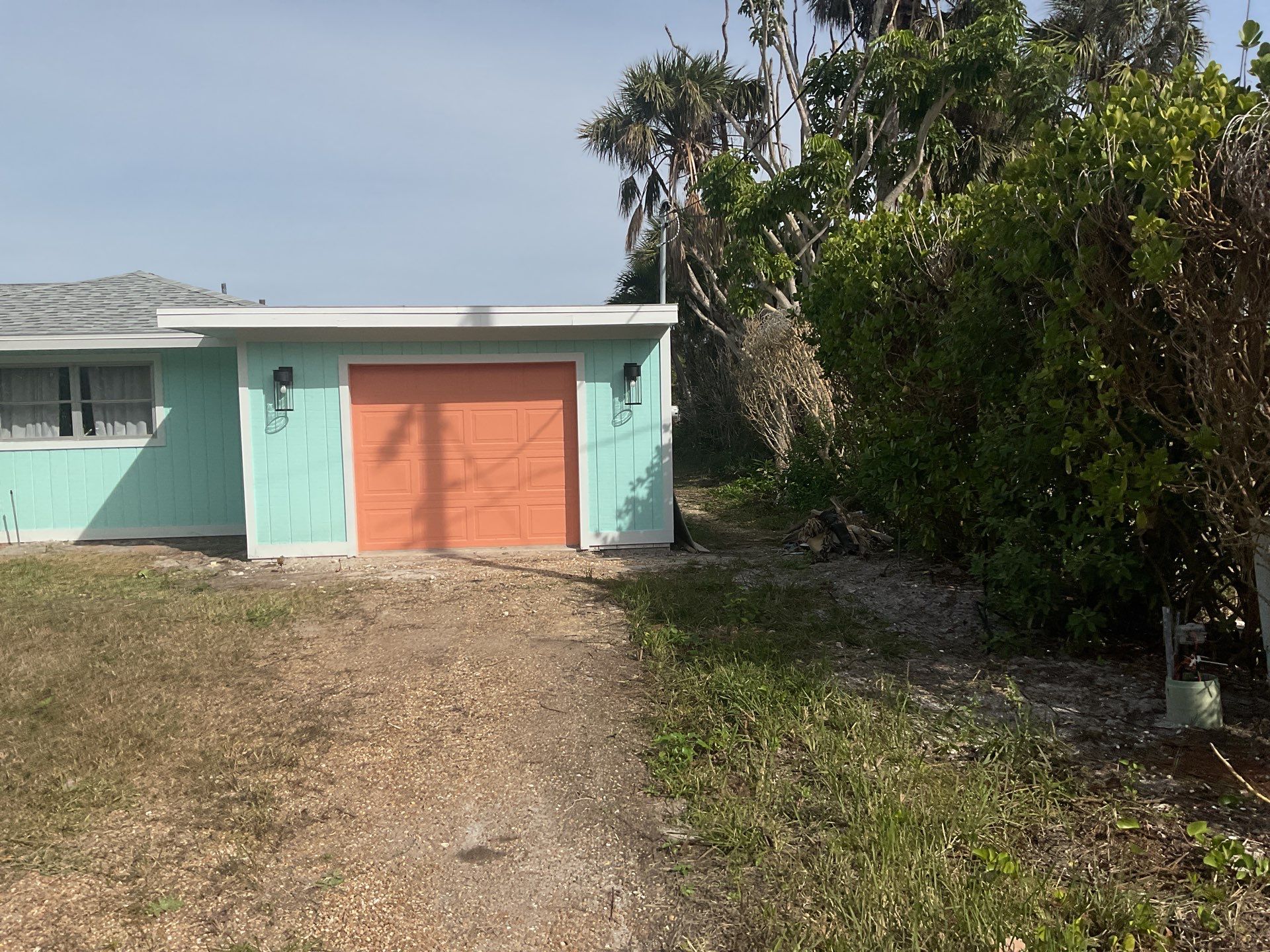 White Seamless Gutters Installation in Sanibel FL by Gutter Professors