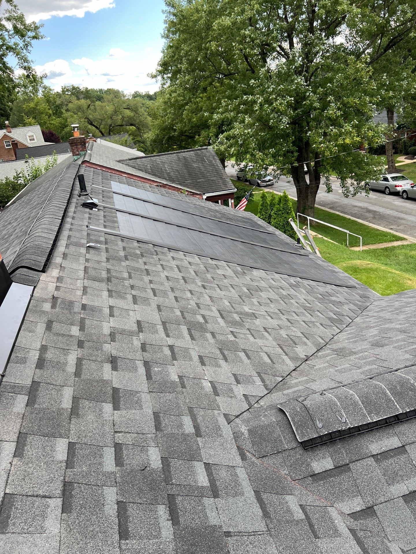 Roof Replacement using GAF Timberline Solar by American Home Contractors