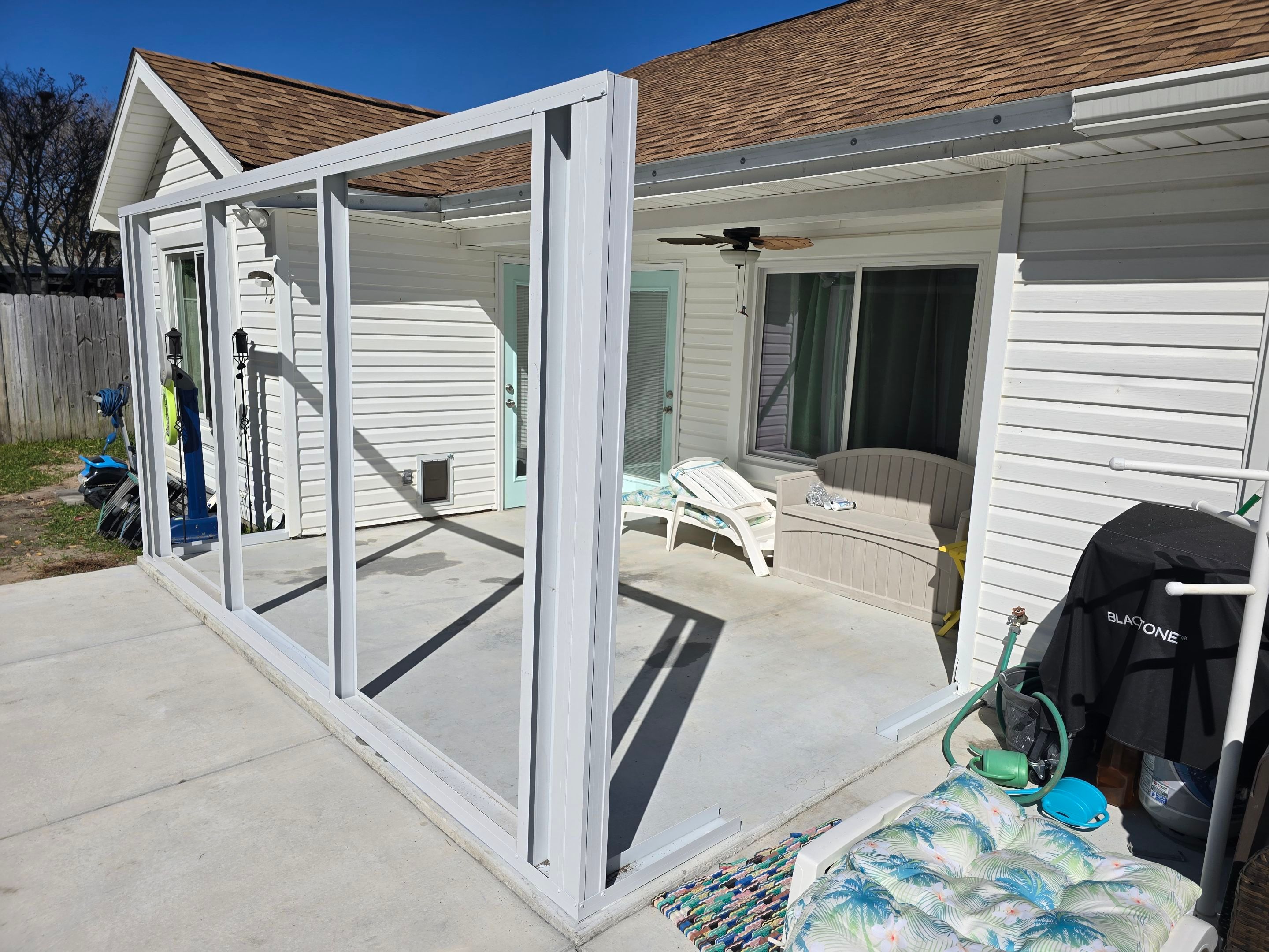 Poolside Glass Room in Gulf Breeze by Titan Sunrooms