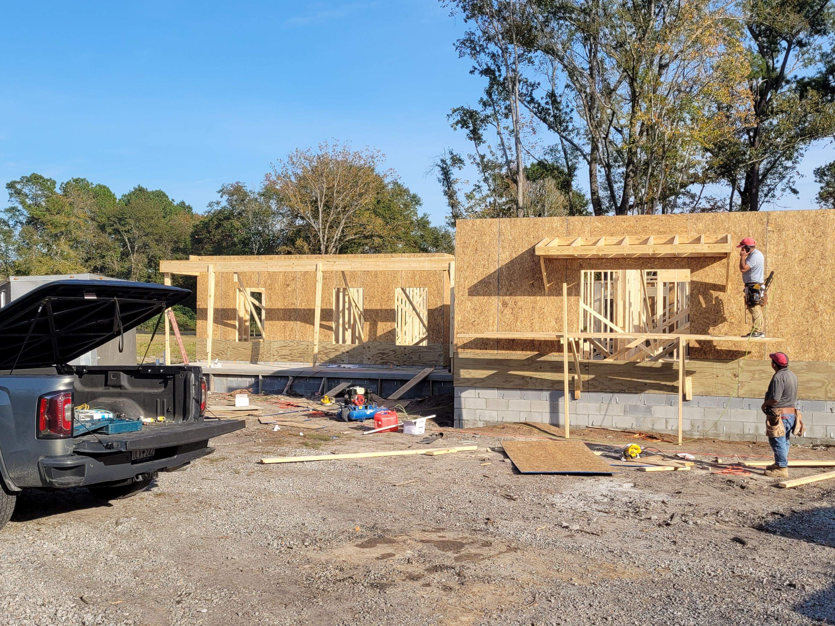 New Home Construction using brick and vertical vinyl by Cornerstone Home Builders, LLC