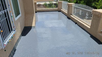 Roof deck coating and repairs