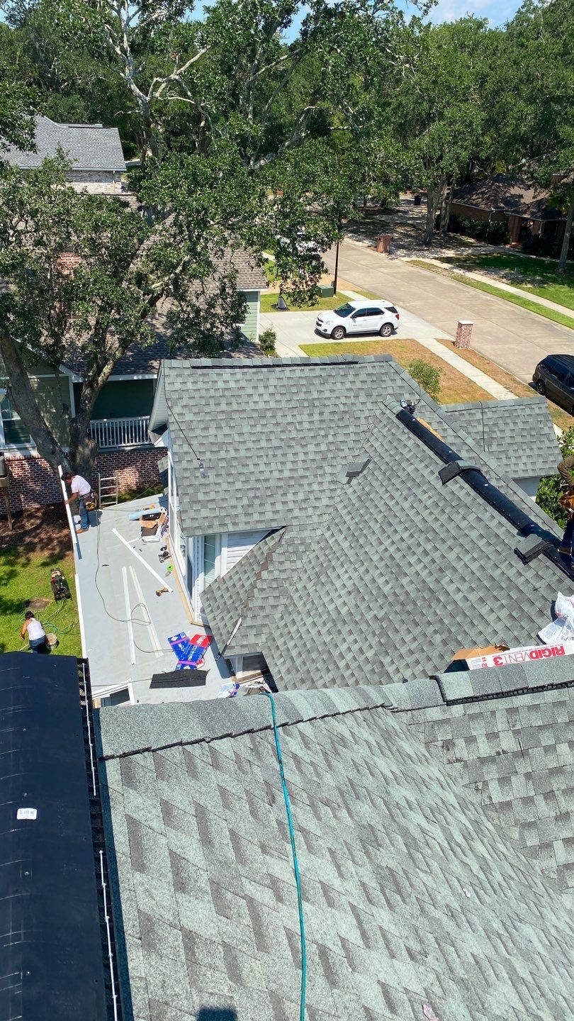 Residential Roofing Installation using Roof Replacement by American Roofing & Construction LLC