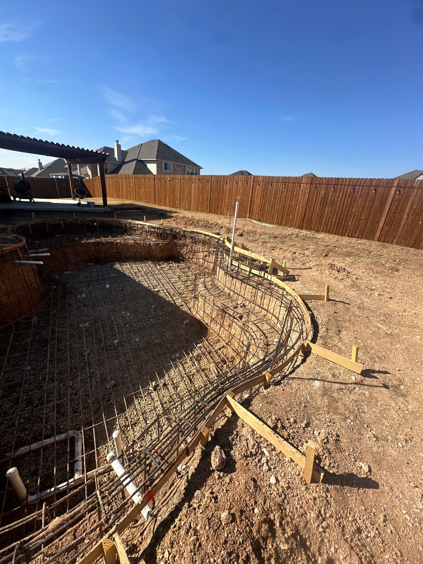 Large Freeform Pool with Tanning Ledge by Pinnacle Pools and Spas - DFW