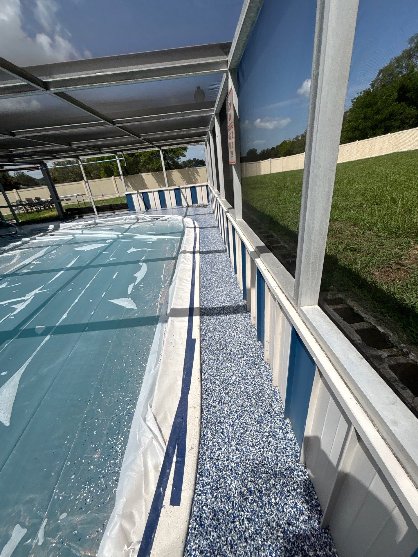 Lake Wales Pool Deck Concrete Coating with Orbit Flake by Performance Floors & Coating