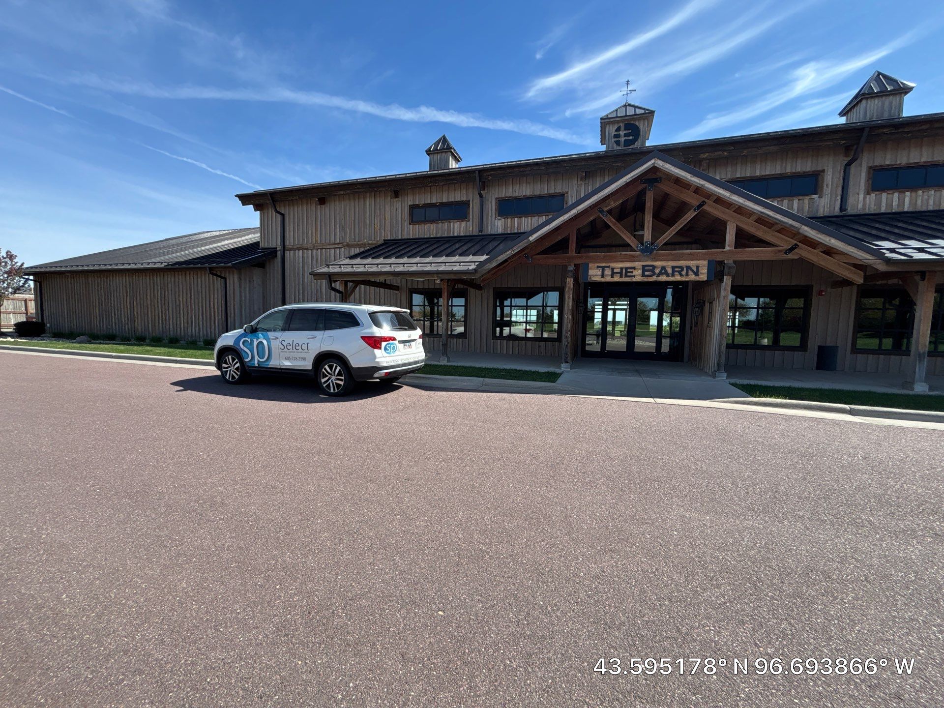 Commercial Exterior Wood Staining for Sanford Barn in Sioux Falls by Select Painting, Coatings & Garage Cabinets