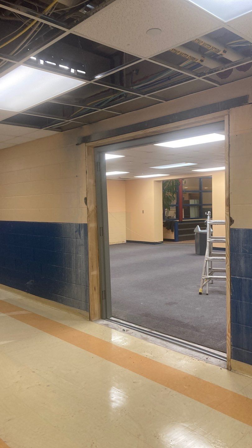 Wall Repair and Door Installation by Dodson House Moving